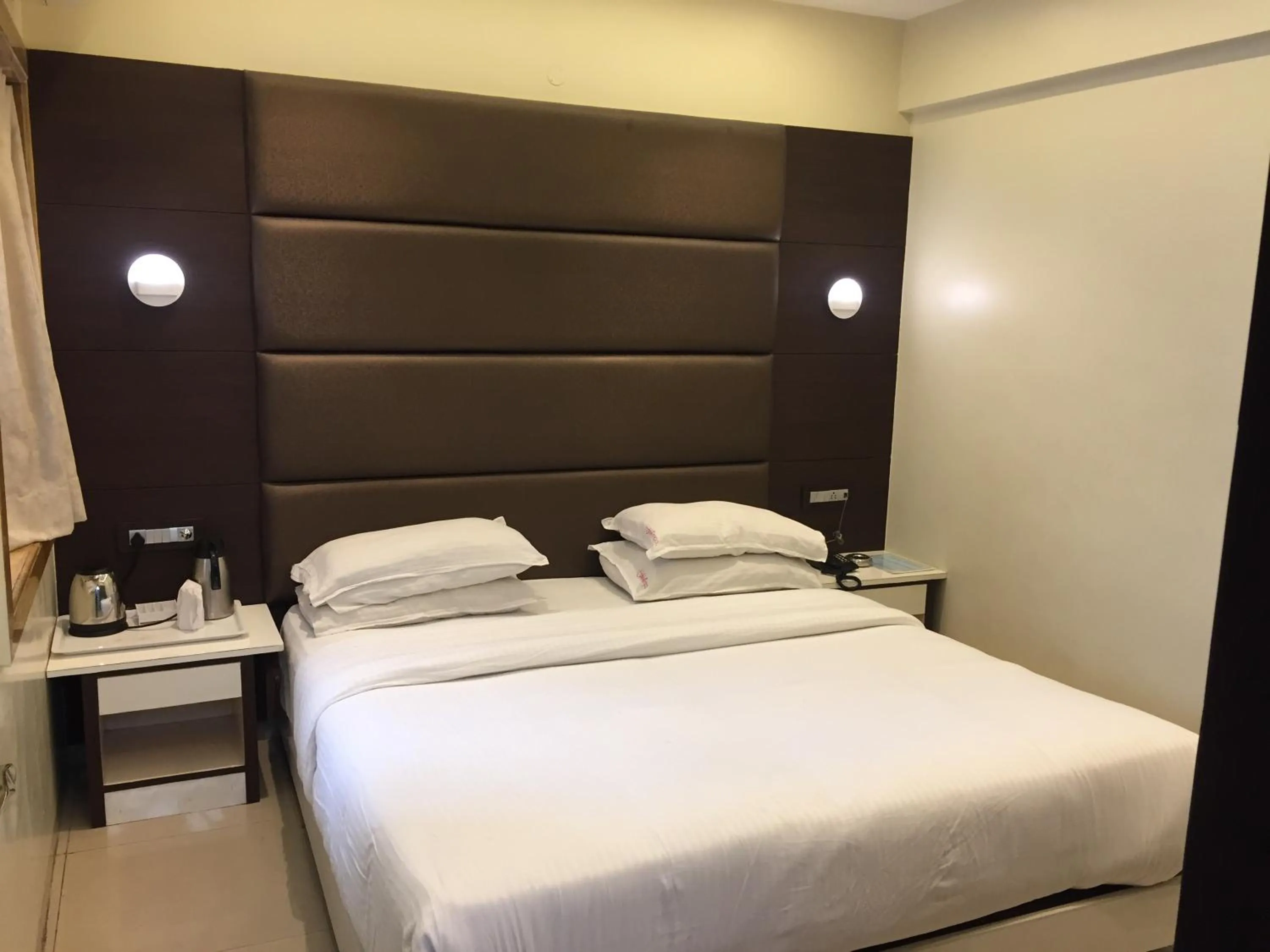 Photo of the whole room, Bed in Hotel Shivkrupa