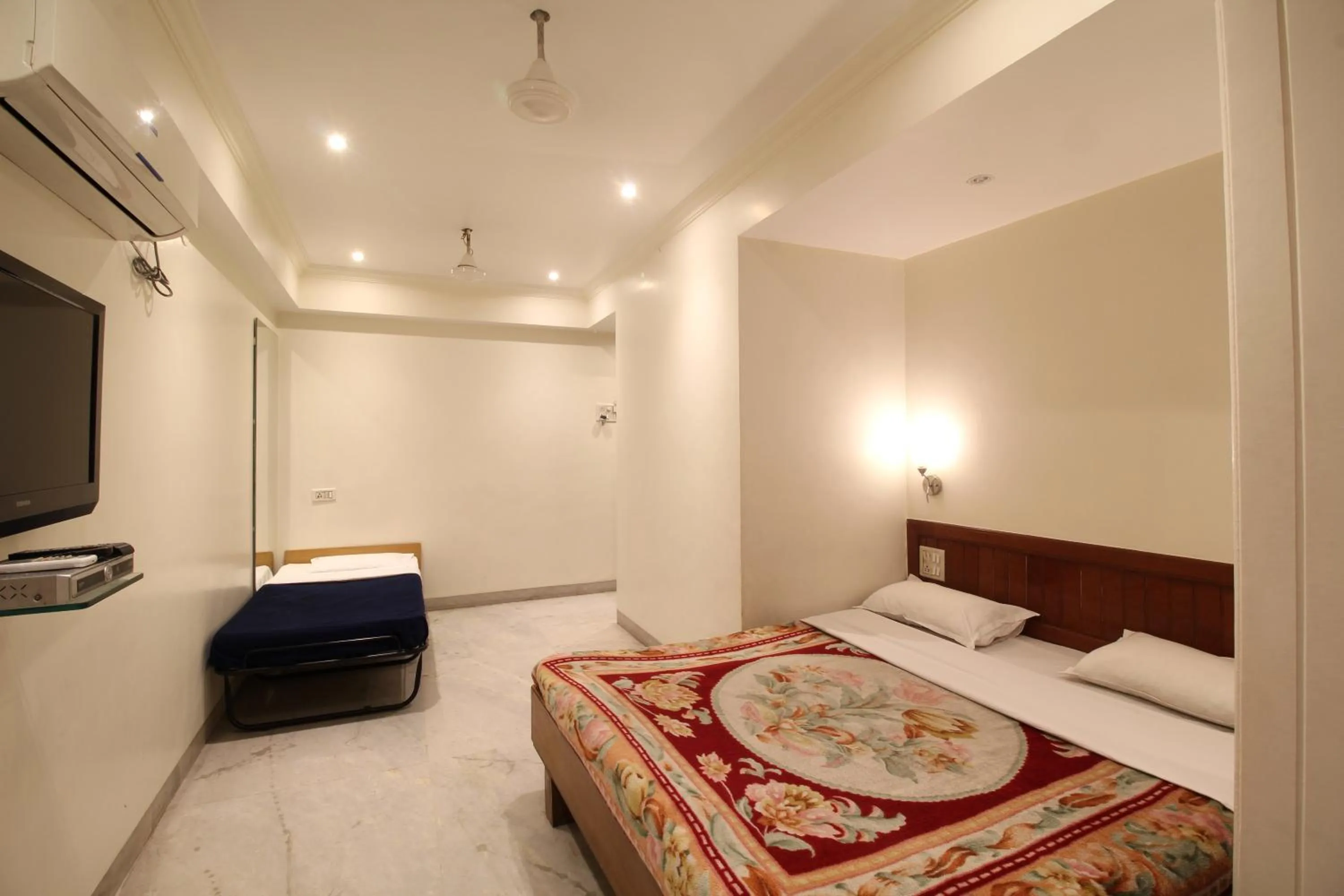 Photo of the whole room, Bed in Hotel Shivkrupa