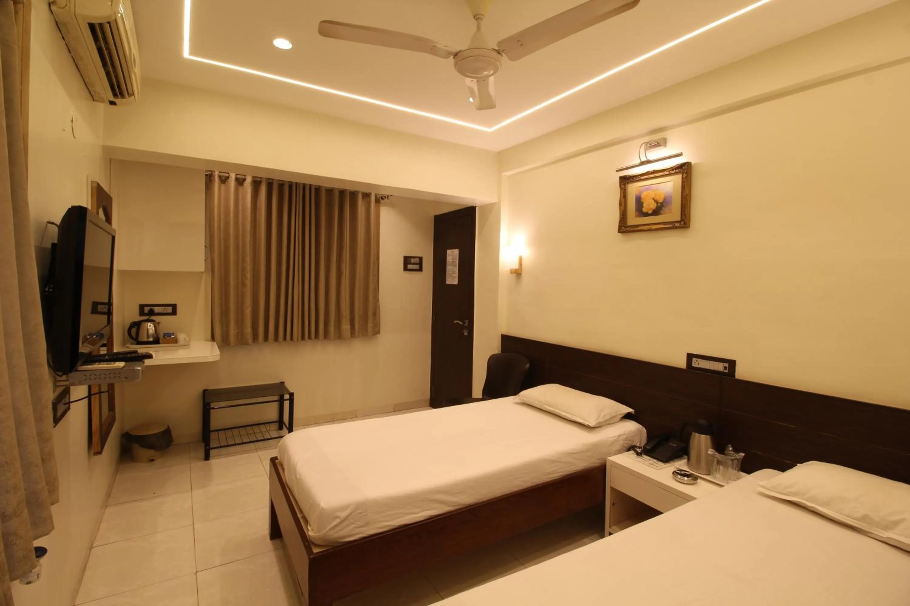 Photo of the whole room, Bed in Hotel Shivkrupa