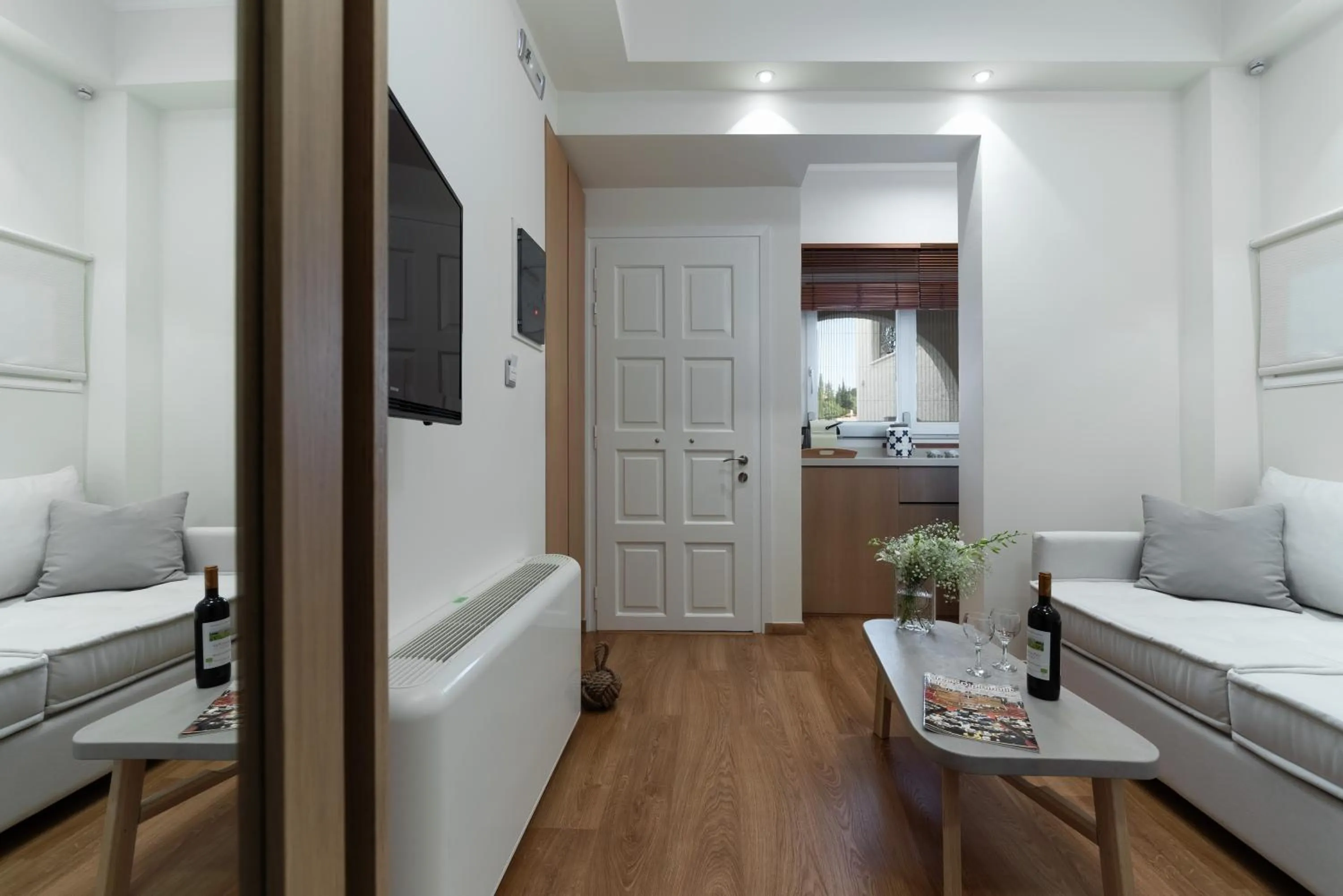 Living room, Bed in Porto Vecchio Luxury Suites