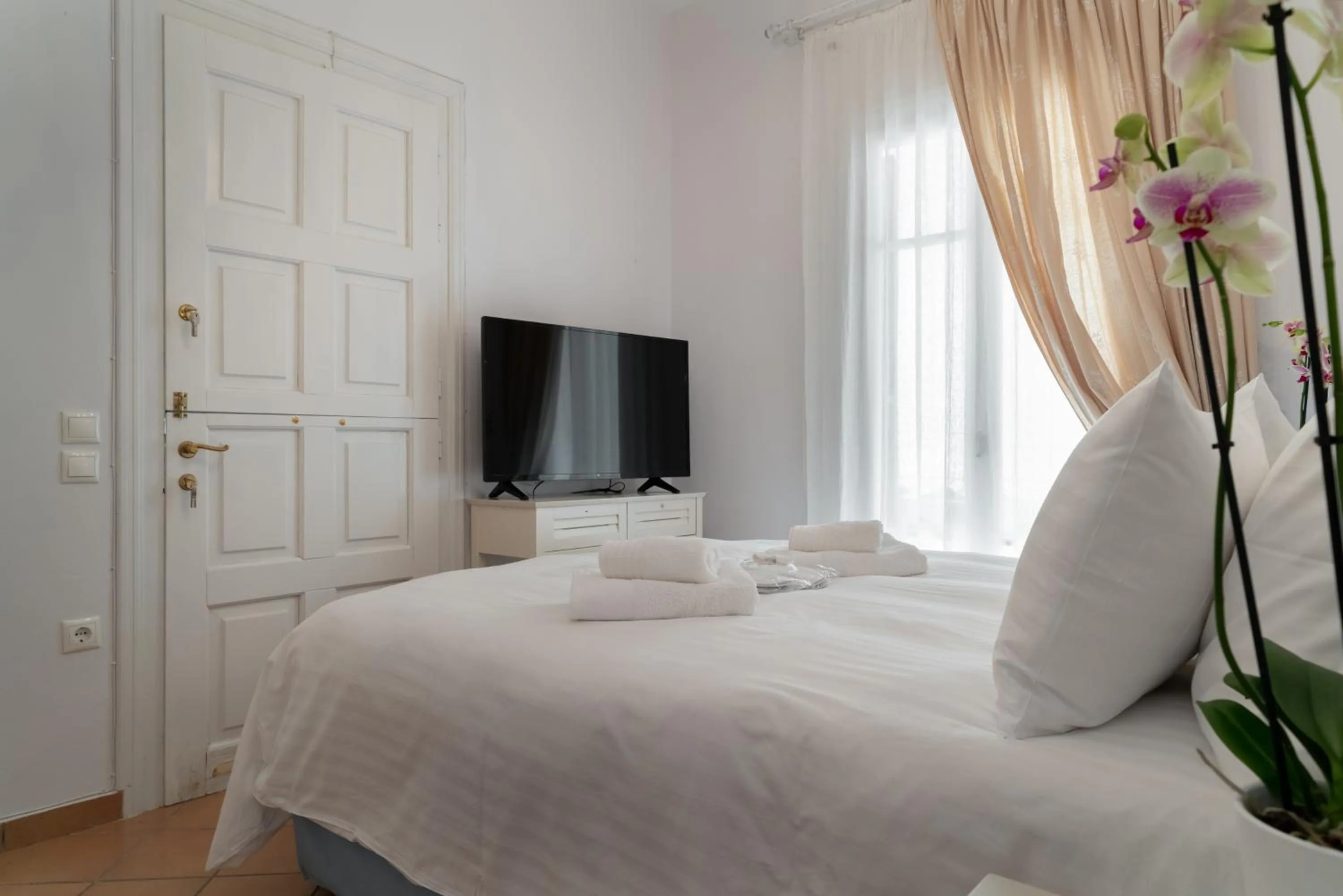 Bed in Porto Vecchio Luxury Suites