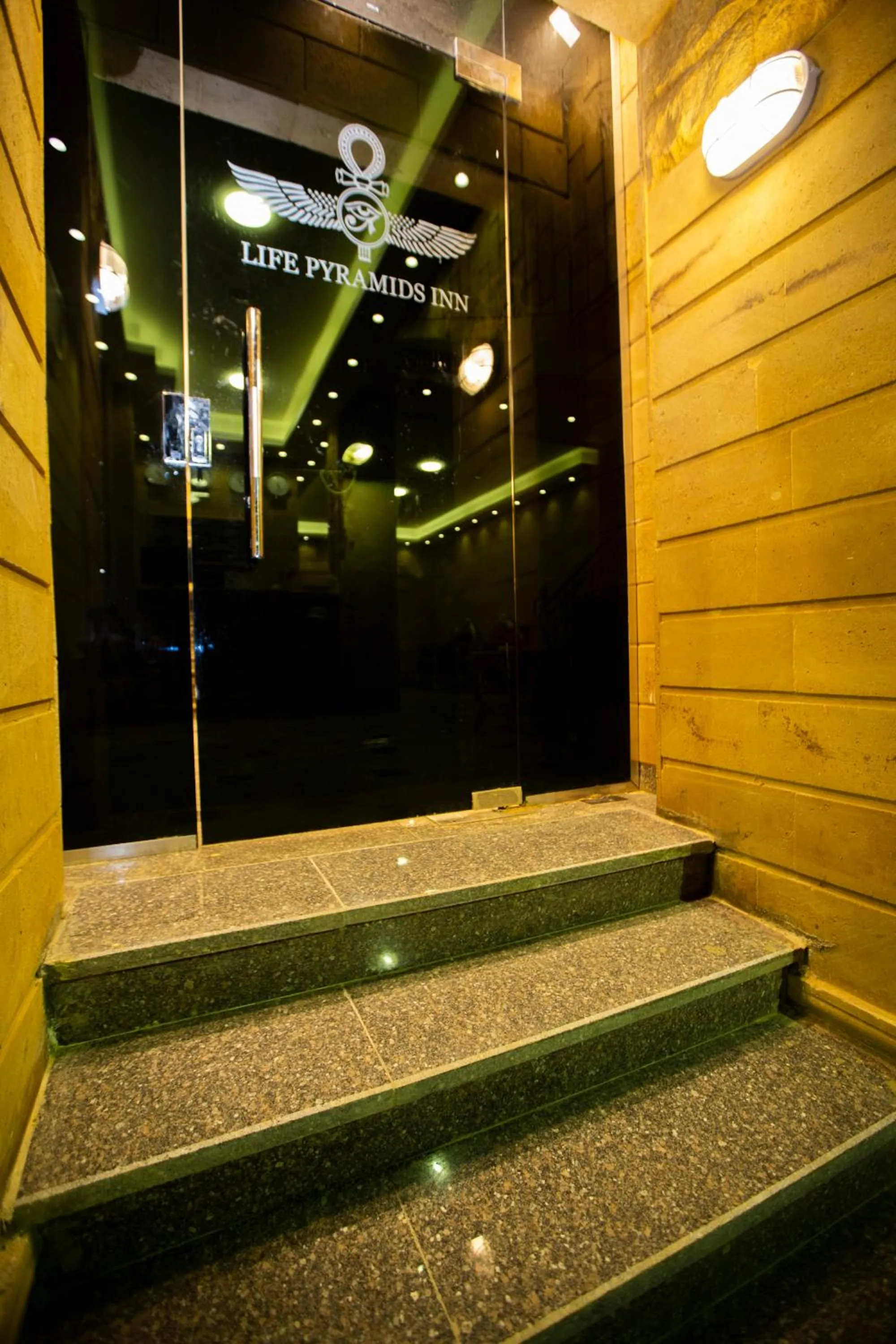 Facade/entrance in Life Pyramids Inn