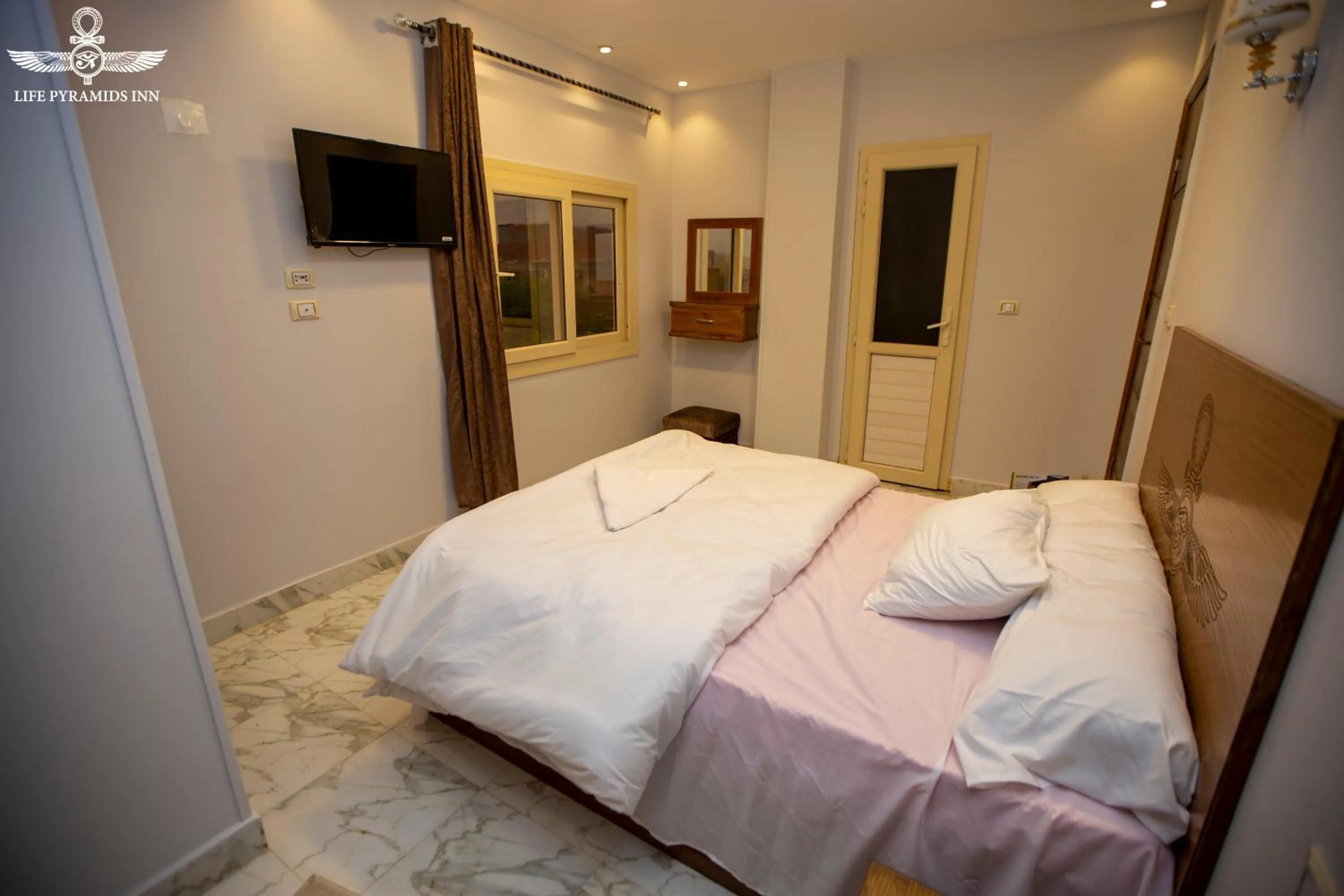 Bed in Life Pyramids Inn