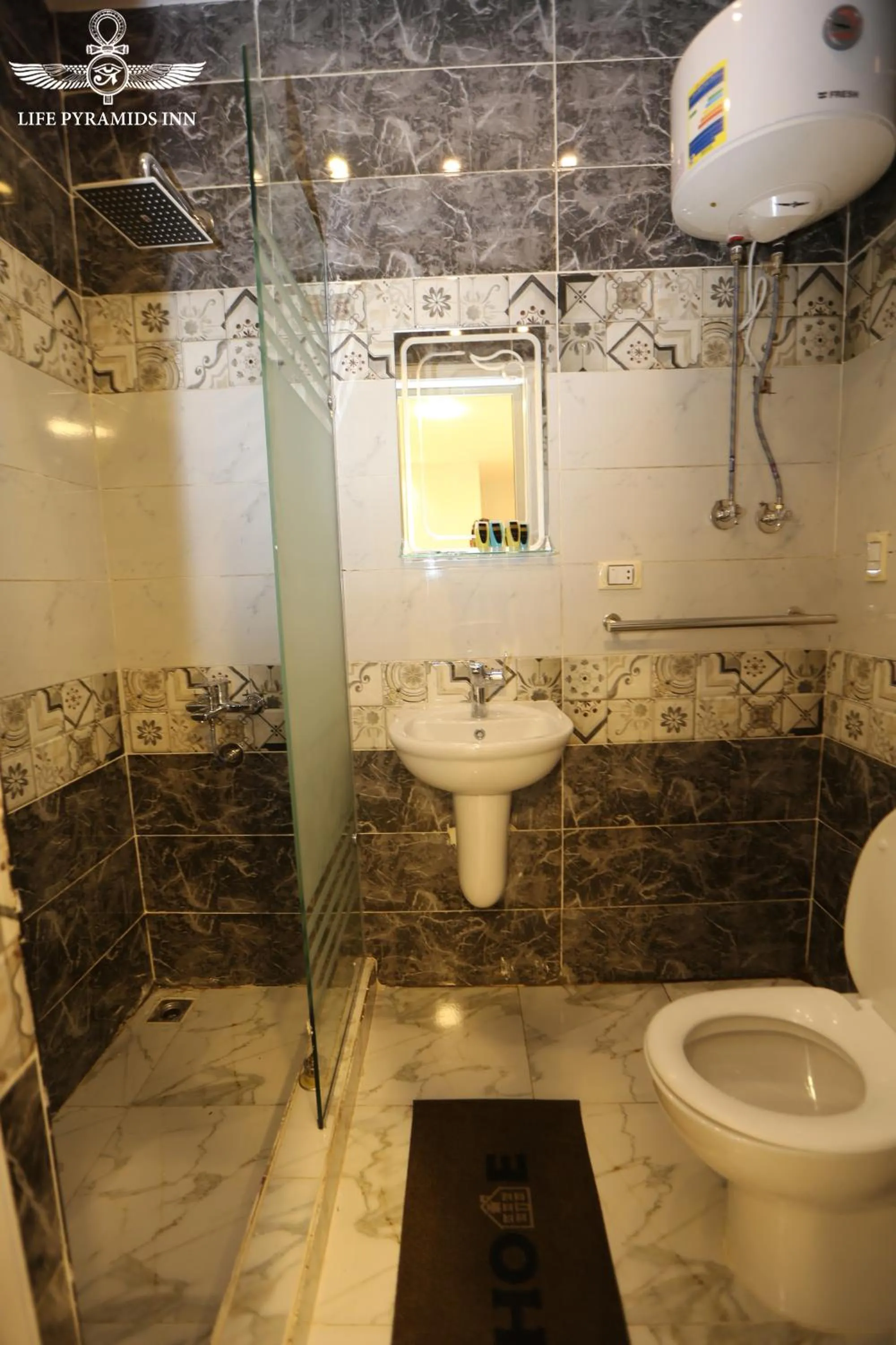 Toilet in Life Pyramids Inn