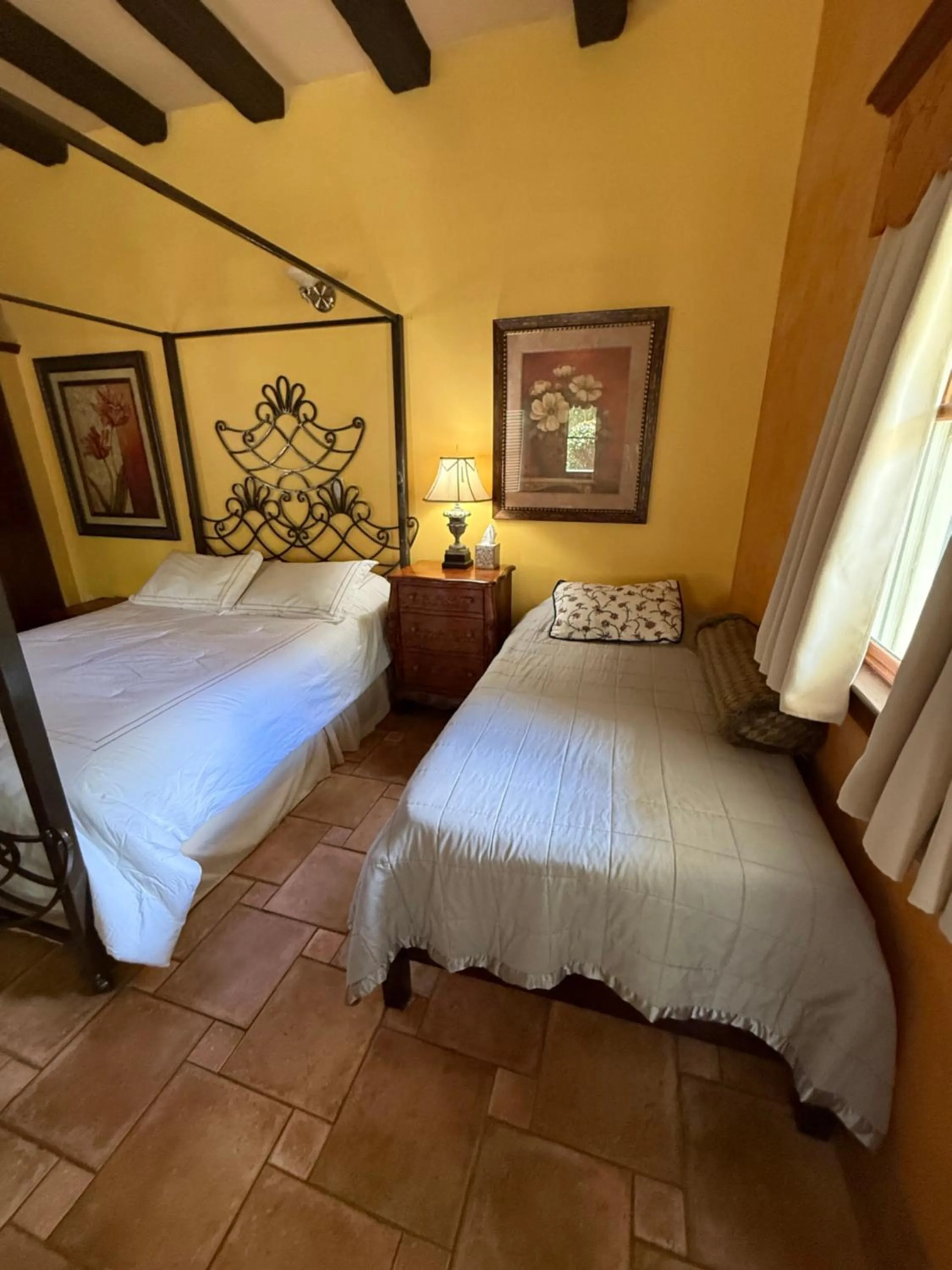 Bed in Flowertown Bed and Breakfast