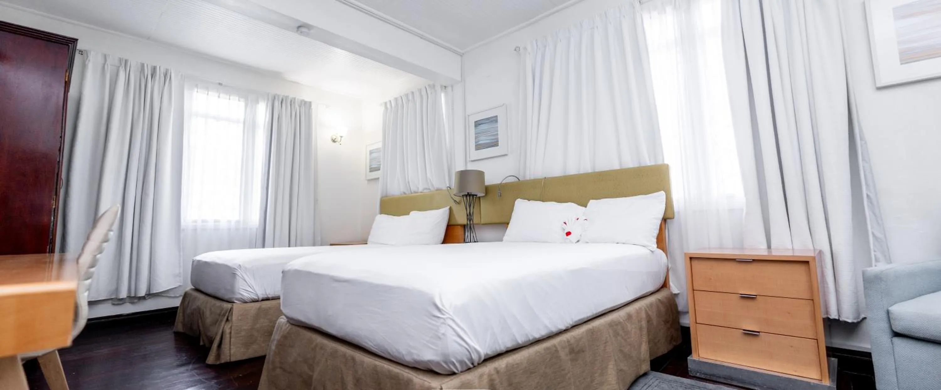 Bed in Ocean's Edge Lodge Restaurant & Bar