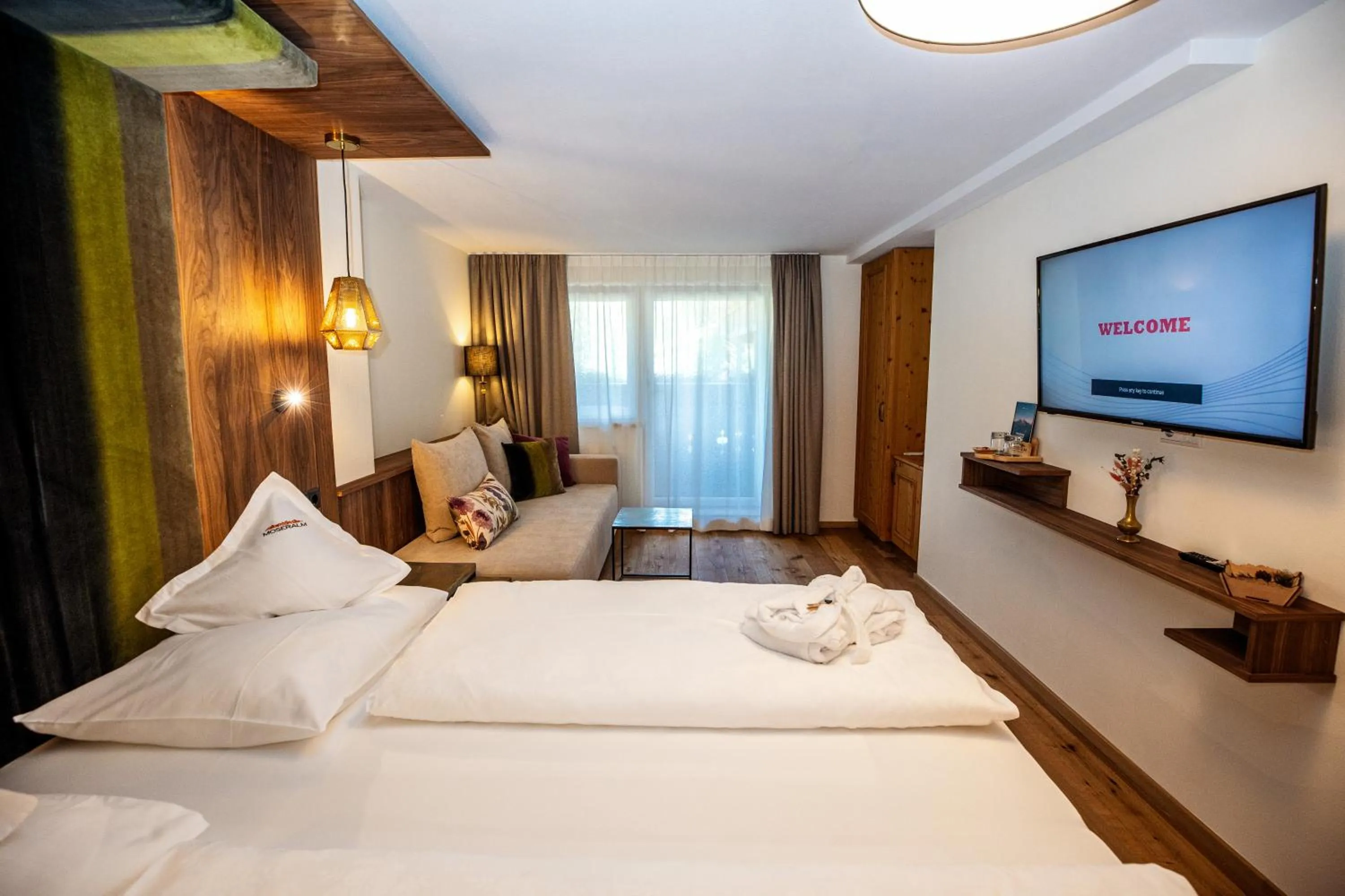 Photo of the whole room, Bed in Moseralm Dolomiti Hideaway