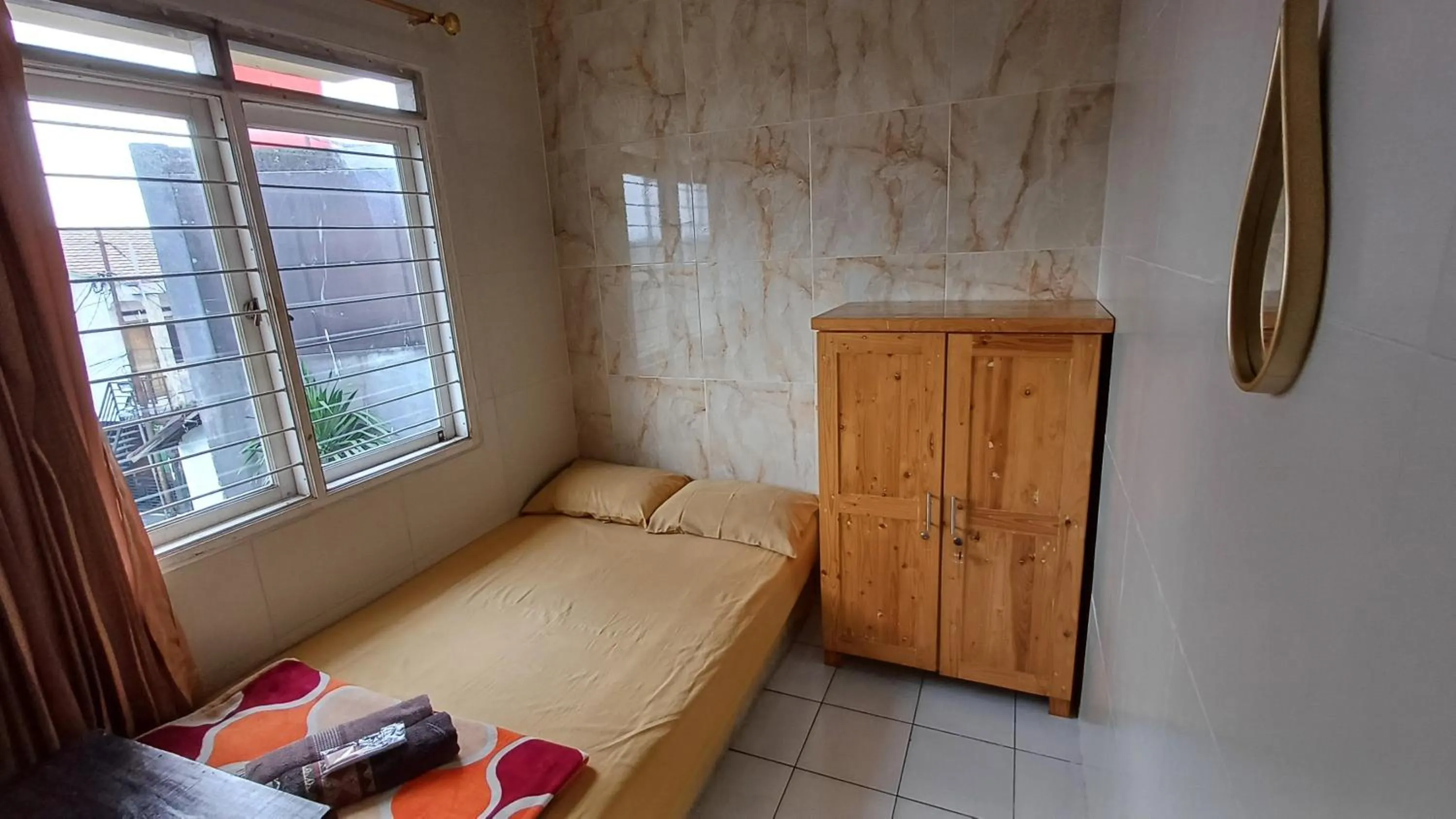 Bedroom, Bed in Kost Carmelia Syariah Baranangsiang Bogor