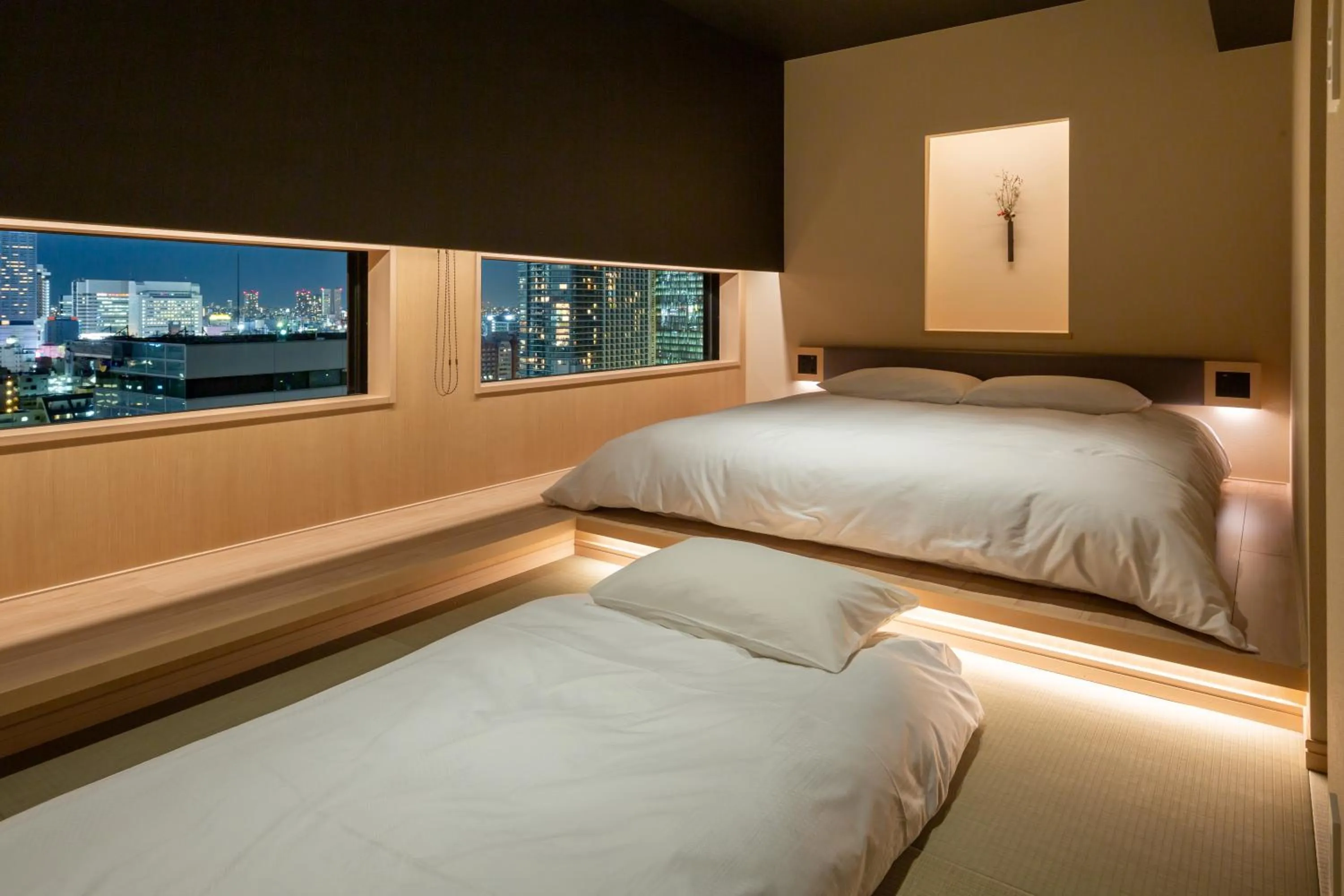 Bed in ONSEN RYOKAN YUEN SHINJUKU