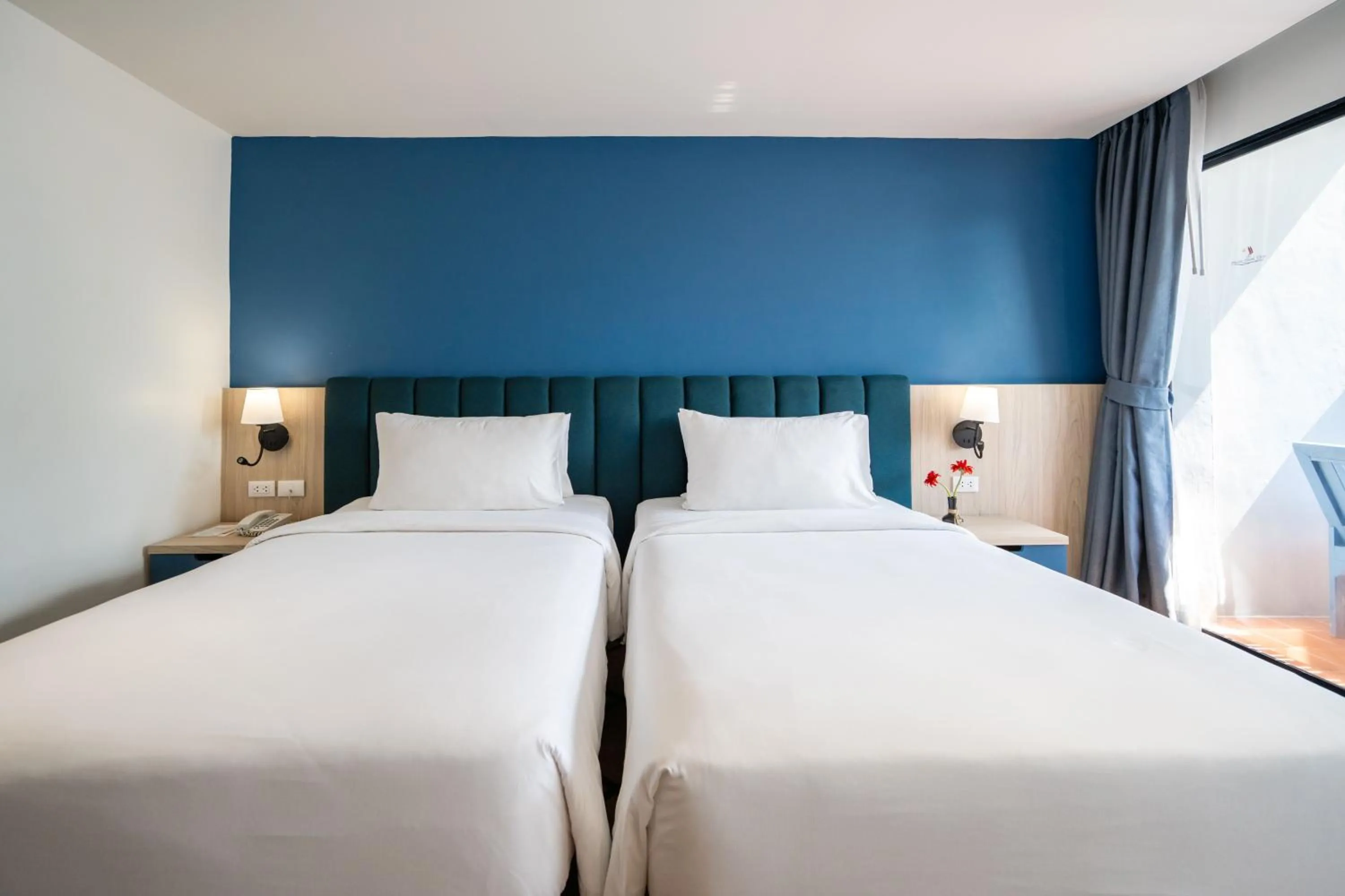 Bed in Phuket Island View Resort - SHA Extra Plus