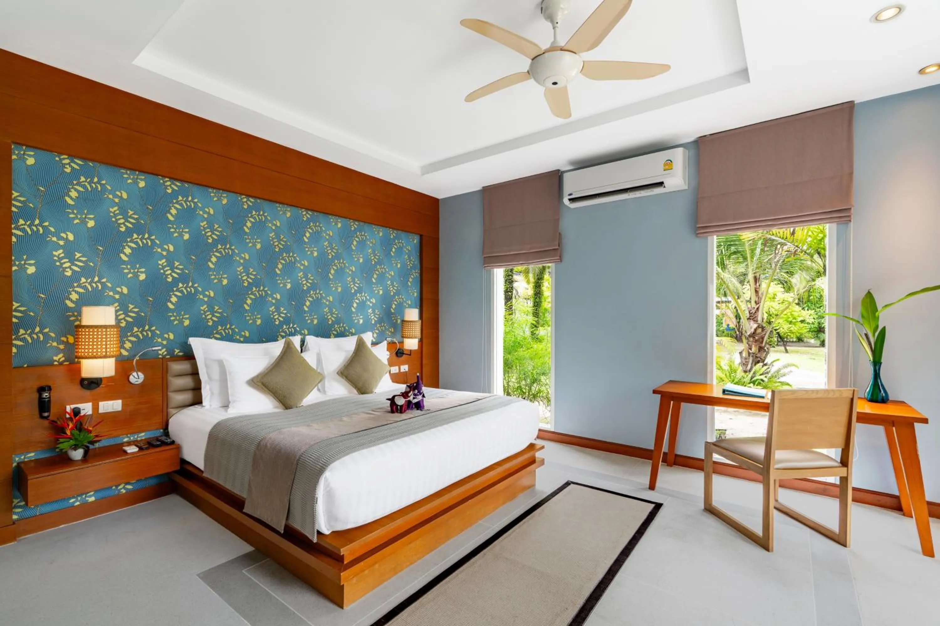 Bed in Apsara Beachfront Resort & Villa