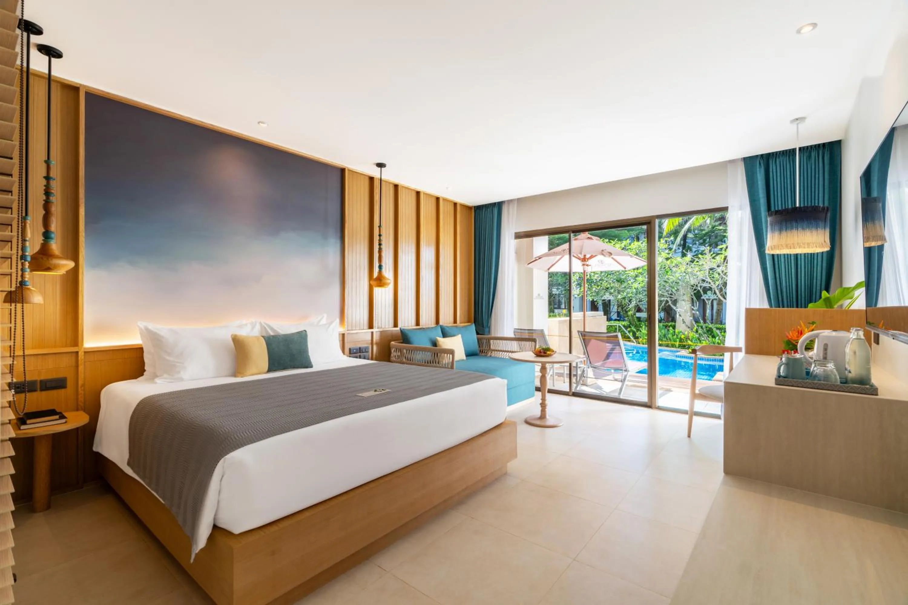 Bed in Apsara Beachfront Resort & Villa
