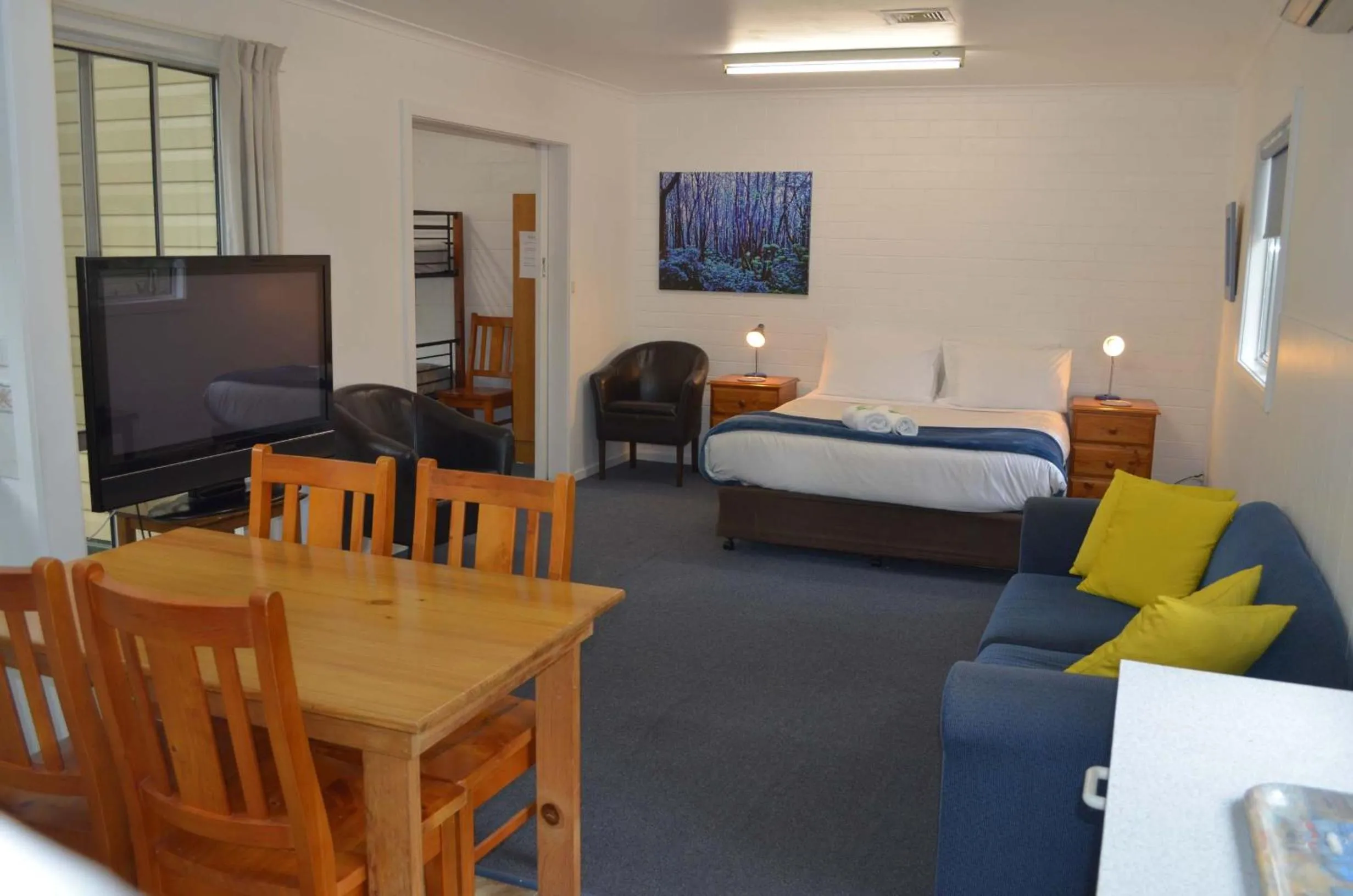 Bed in Alpine Riverside Cottages