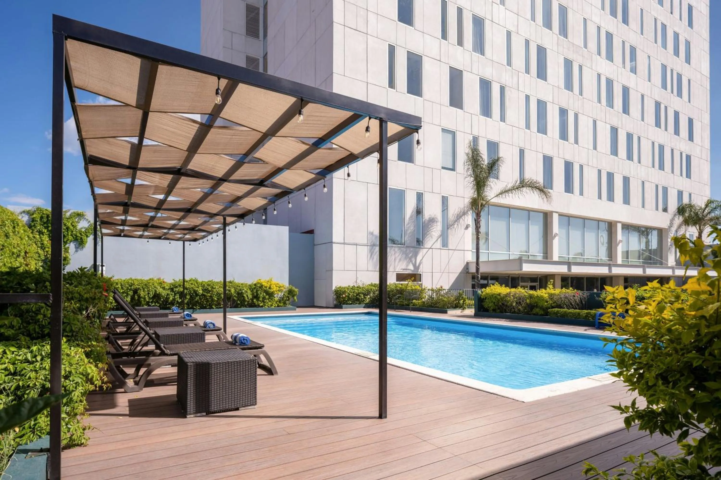 Swimming pool in Courtyard by Marriott Leon at The Poliforum