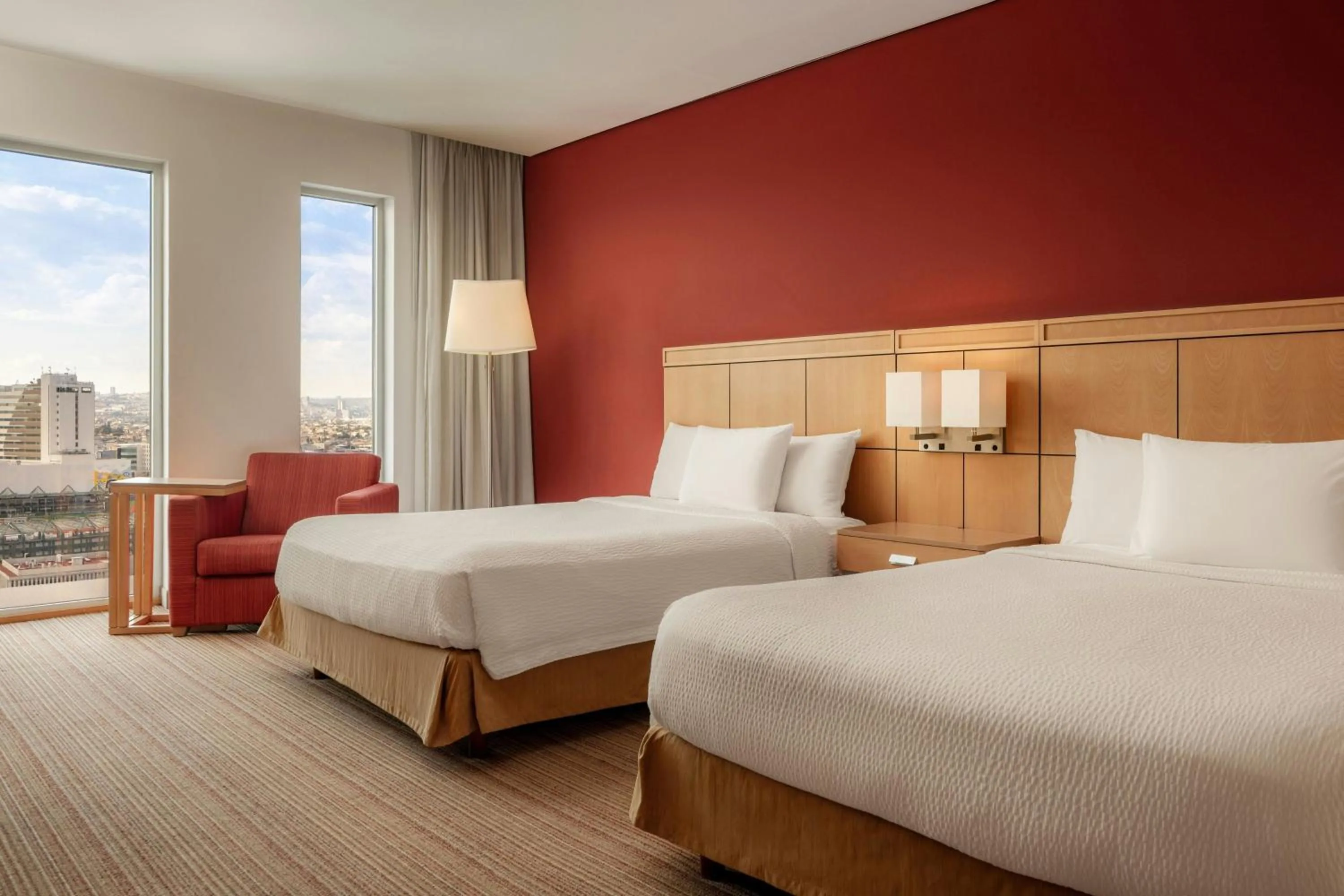 Photo of the whole room, Bed in Courtyard by Marriott Leon at The Poliforum