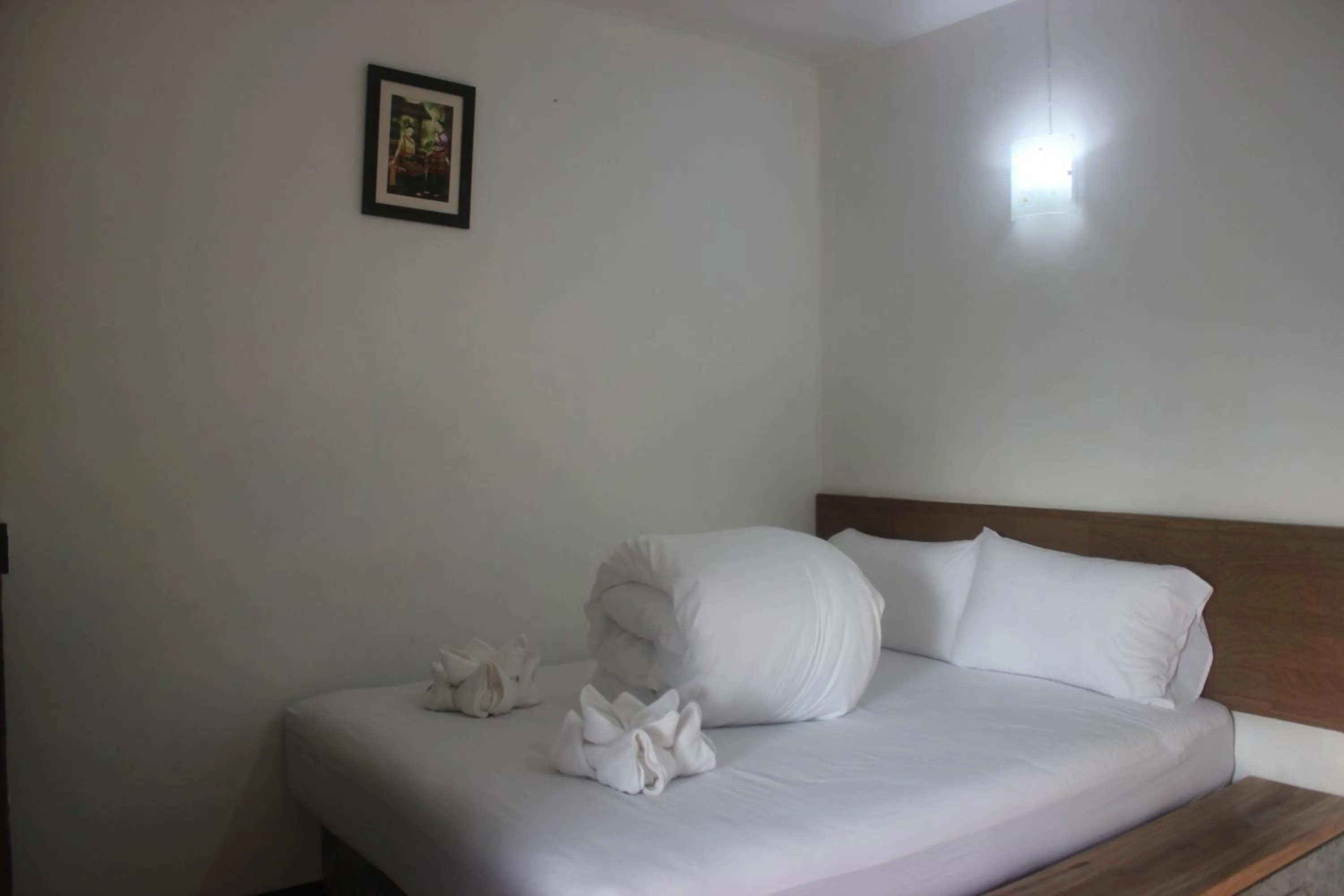 Bed in The Stamp Hotel