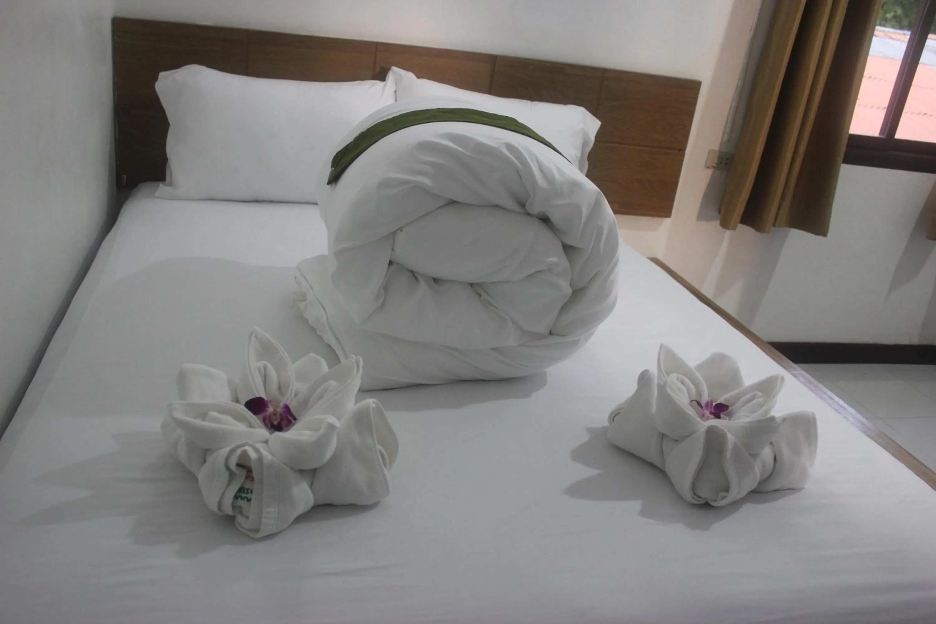 Bed in The Stamp Hotel