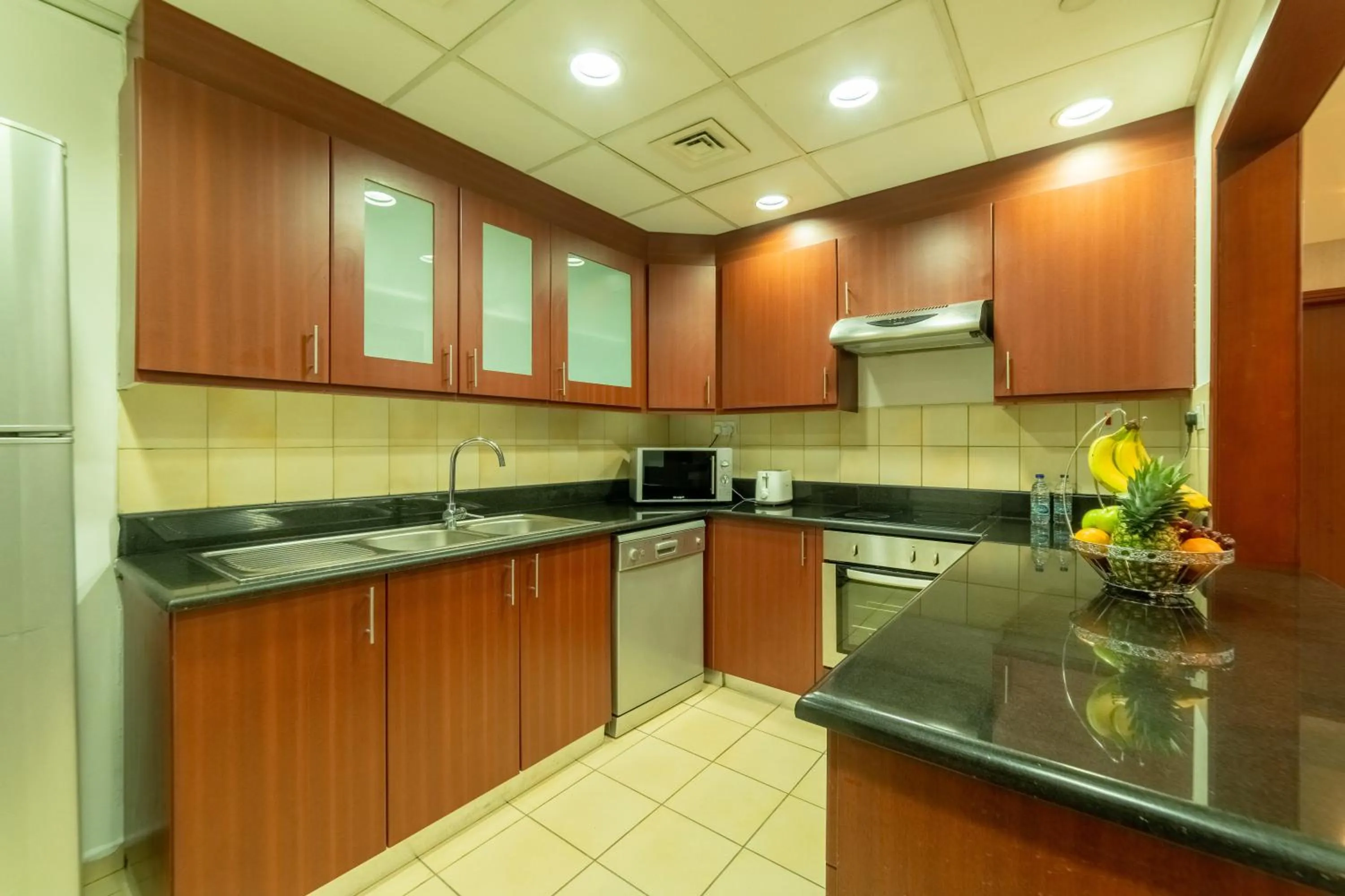 Kitchen or kitchenette in SUHA JBR Hotel Apartments
