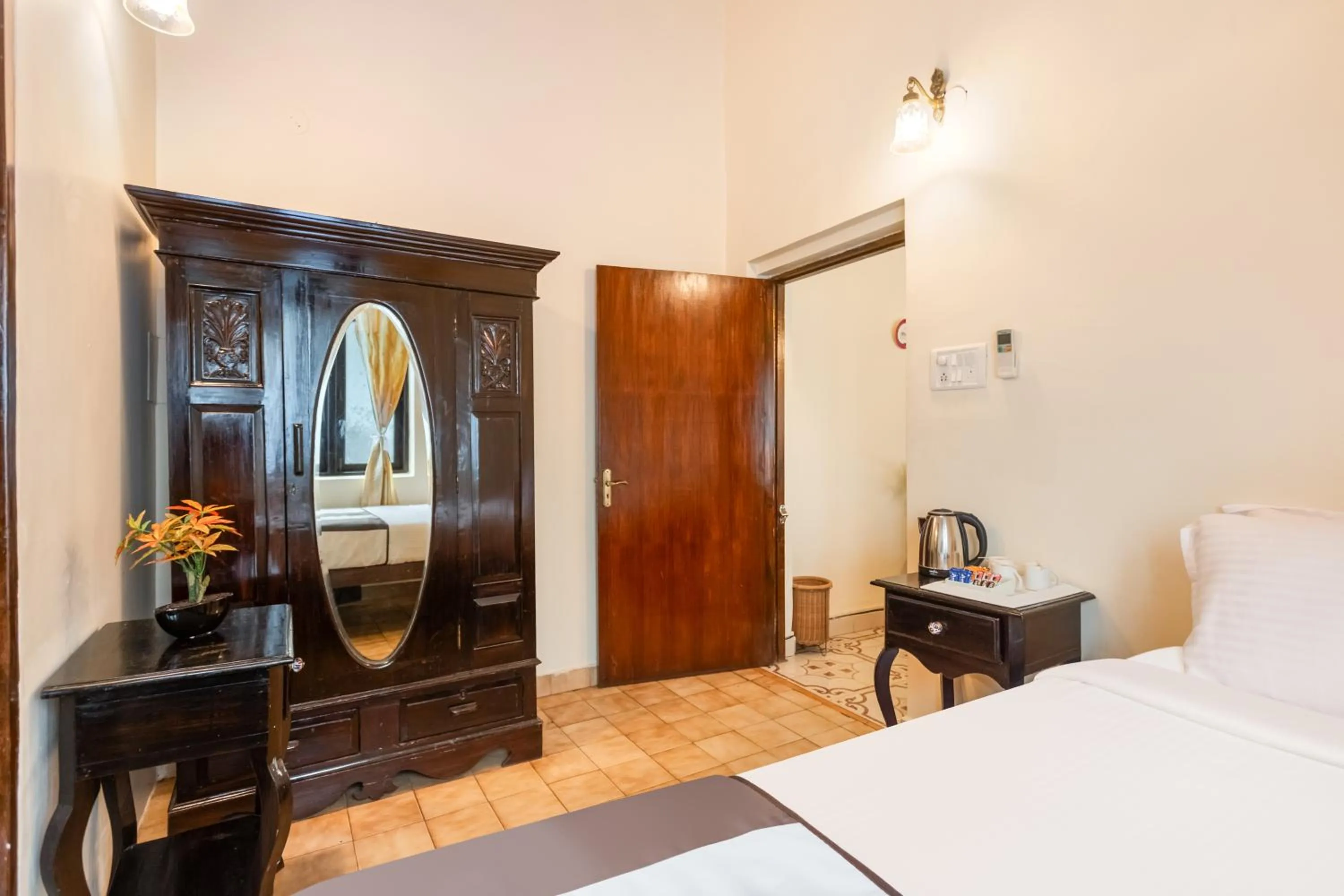 wardrobe, Bed in The Tamarind Hotel - A Boutique Heritage Stay, Anjuna - Goa