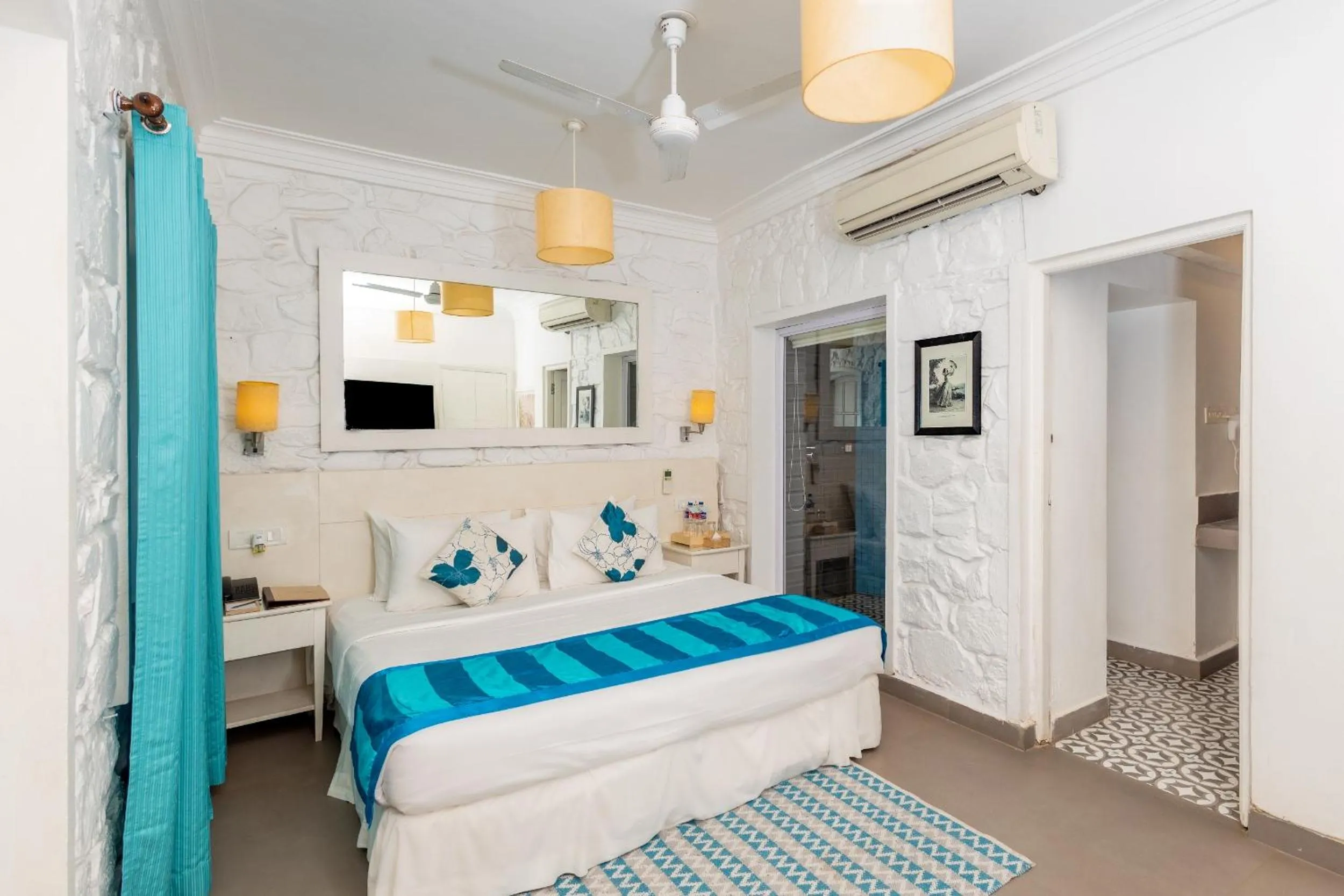 TV and multimedia, Bed in The Tamarind Hotel - A Boutique Heritage Stay, Anjuna - Goa