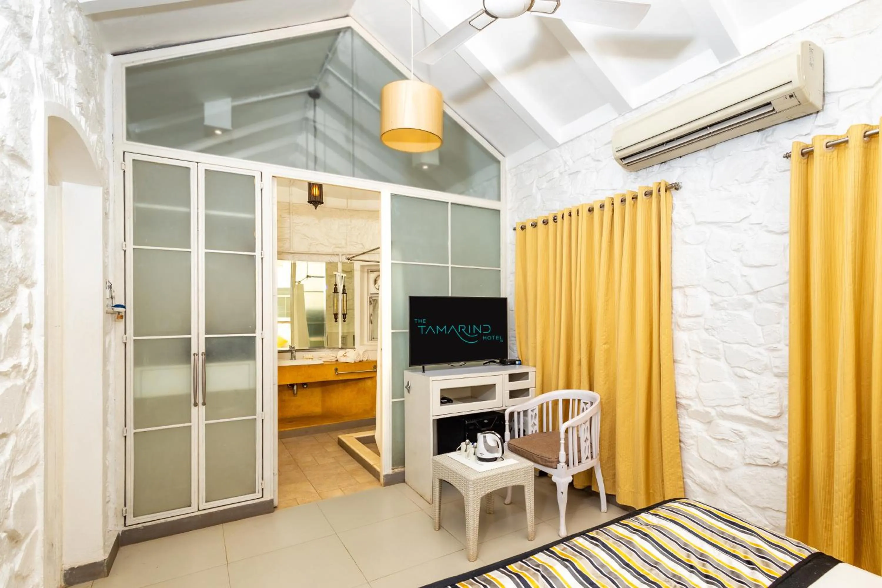 TV and multimedia in The Tamarind Hotel - A Boutique Heritage Stay, Anjuna - Goa