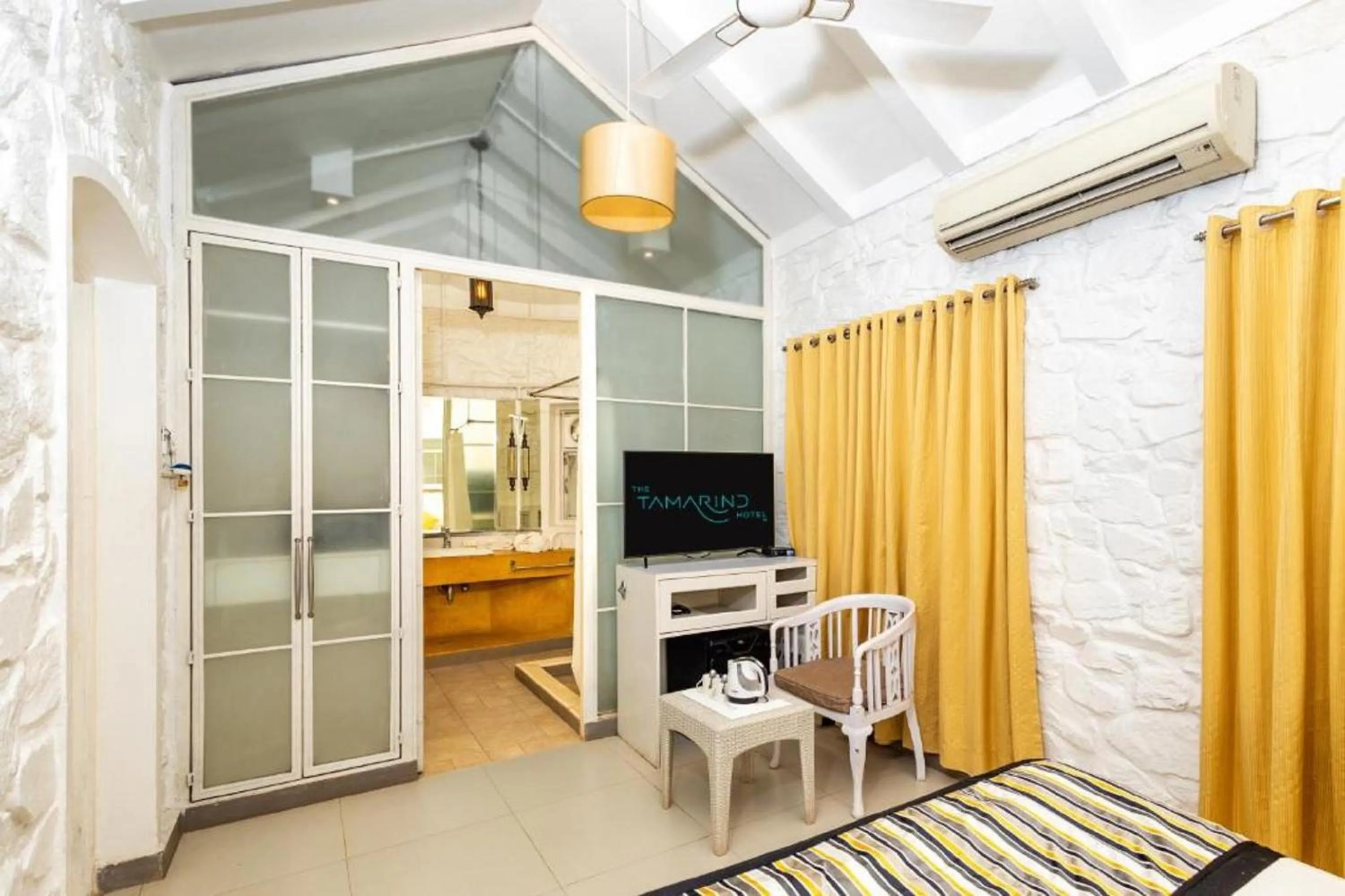 TV and multimedia in The Tamarind Hotel - A Boutique Heritage Stay, Anjuna - Goa