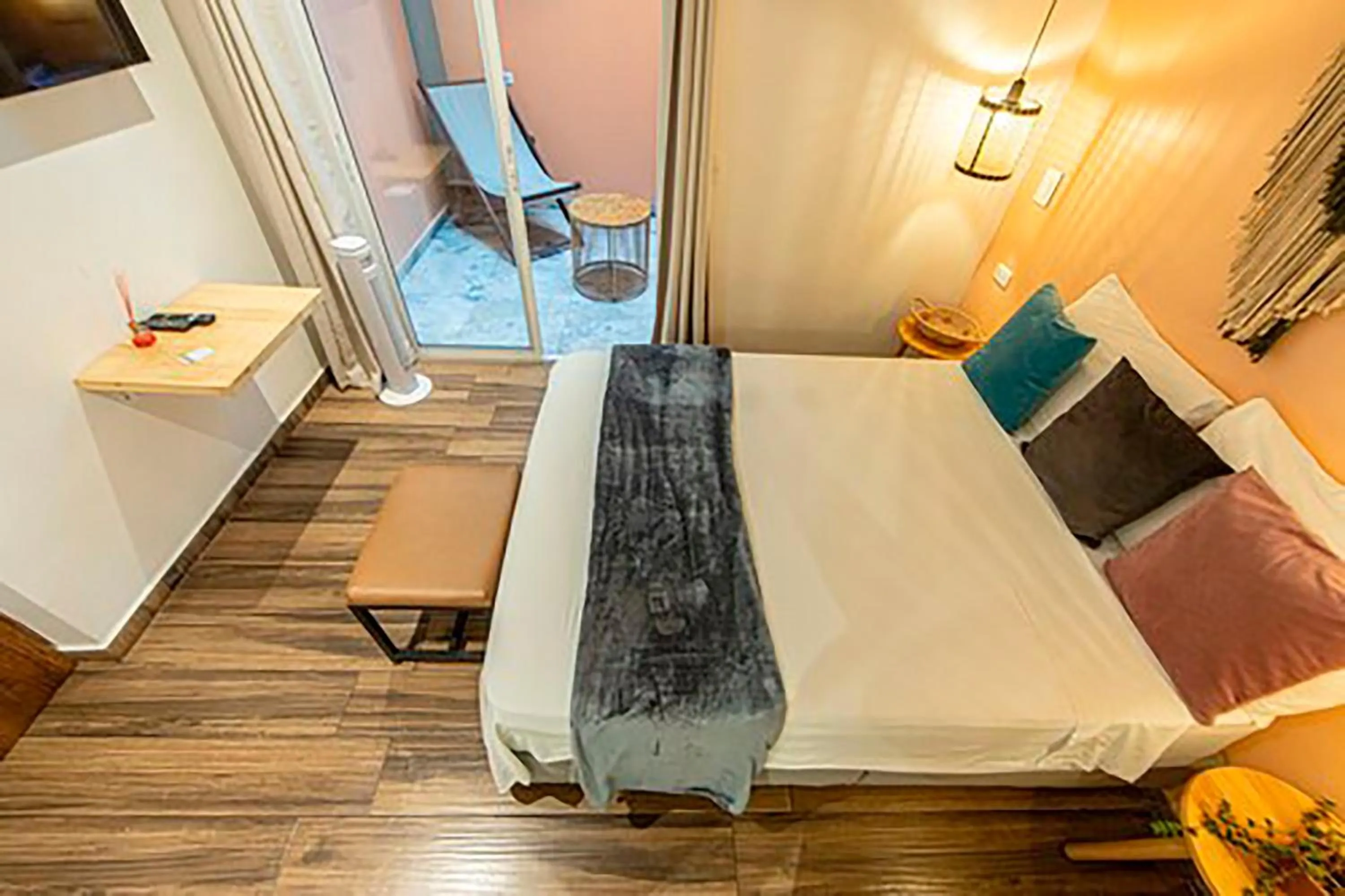 Bed in La Martina Boutique Hotel