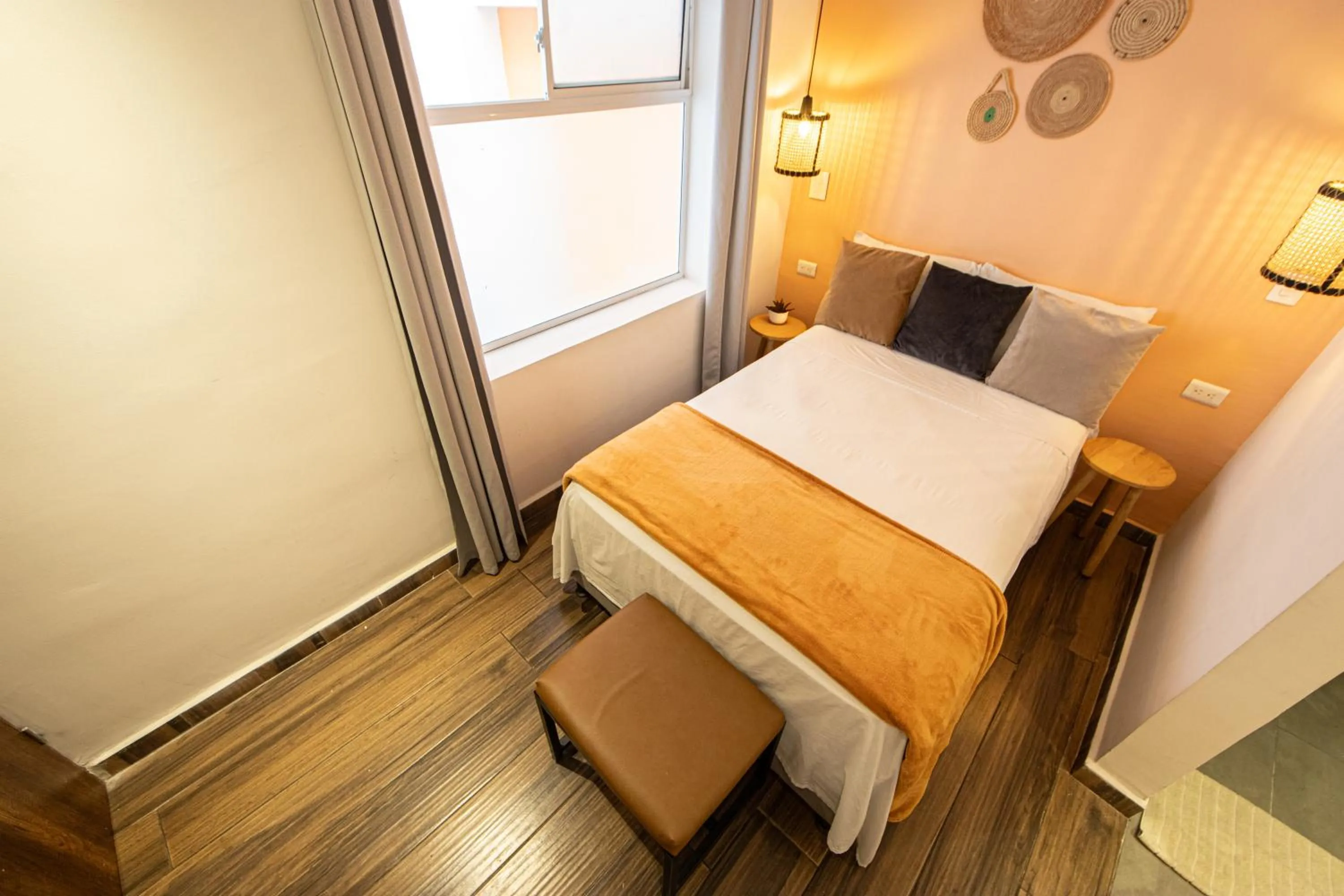 Bed in La Martina Boutique Hotel