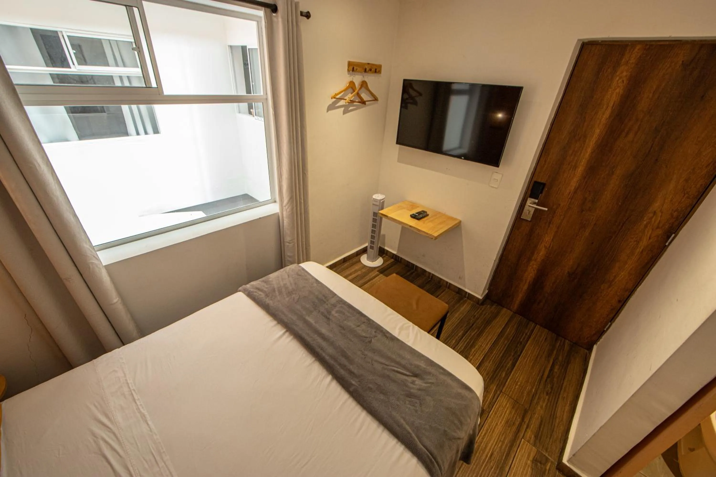 Bed in La Martina Boutique Hotel