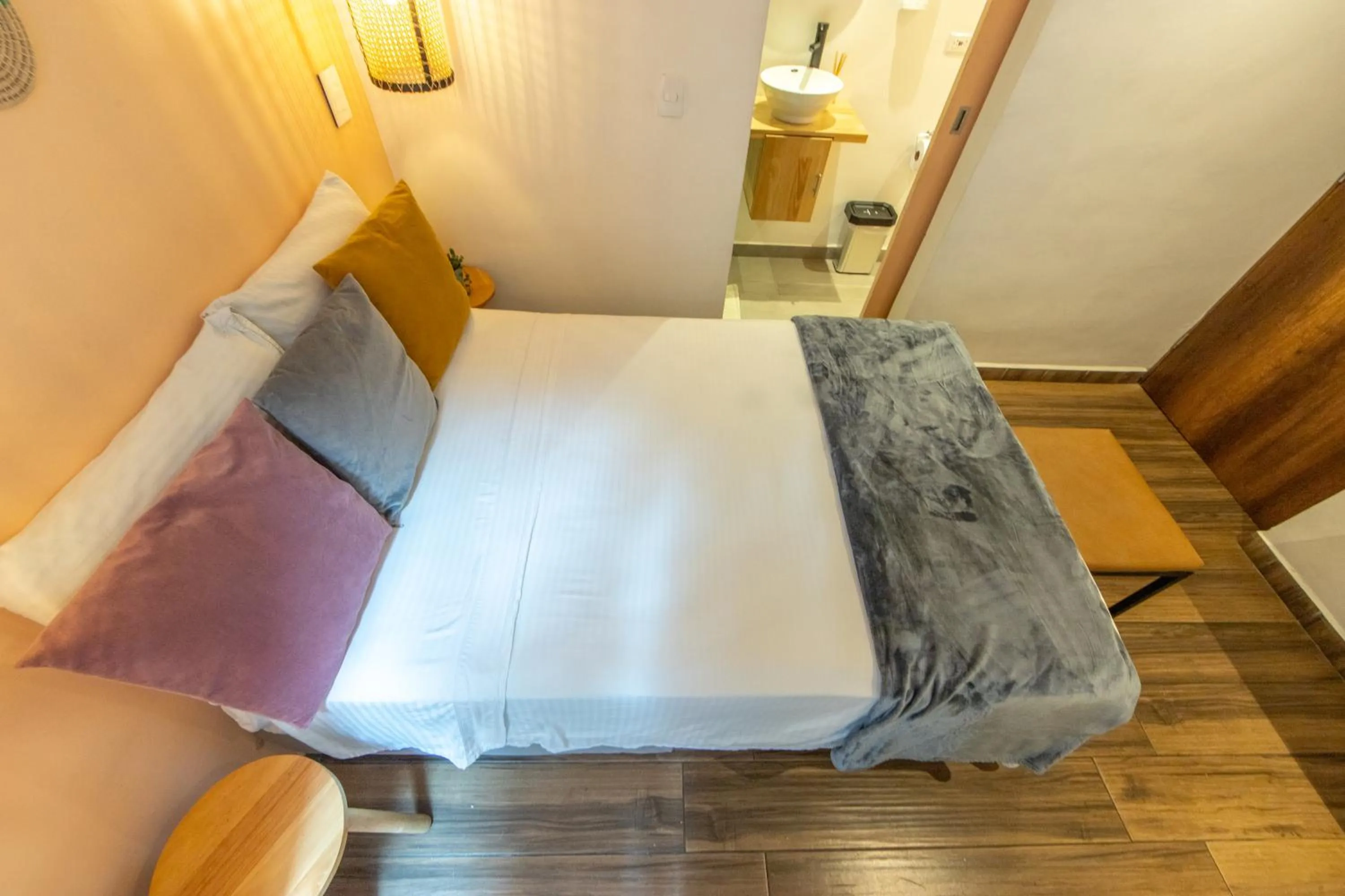 Bed in La Martina Boutique Hotel