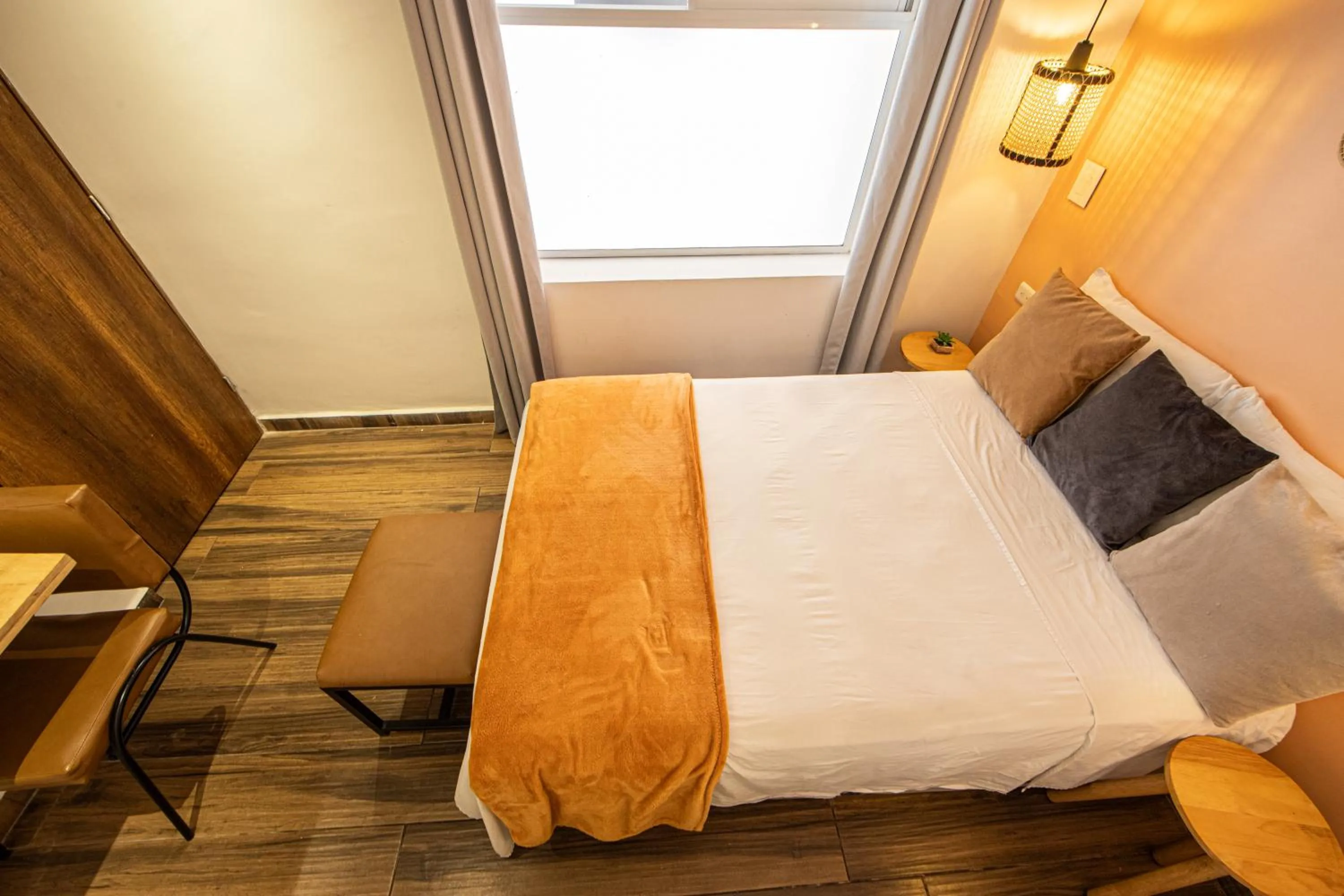 Bed in La Martina Boutique Hotel