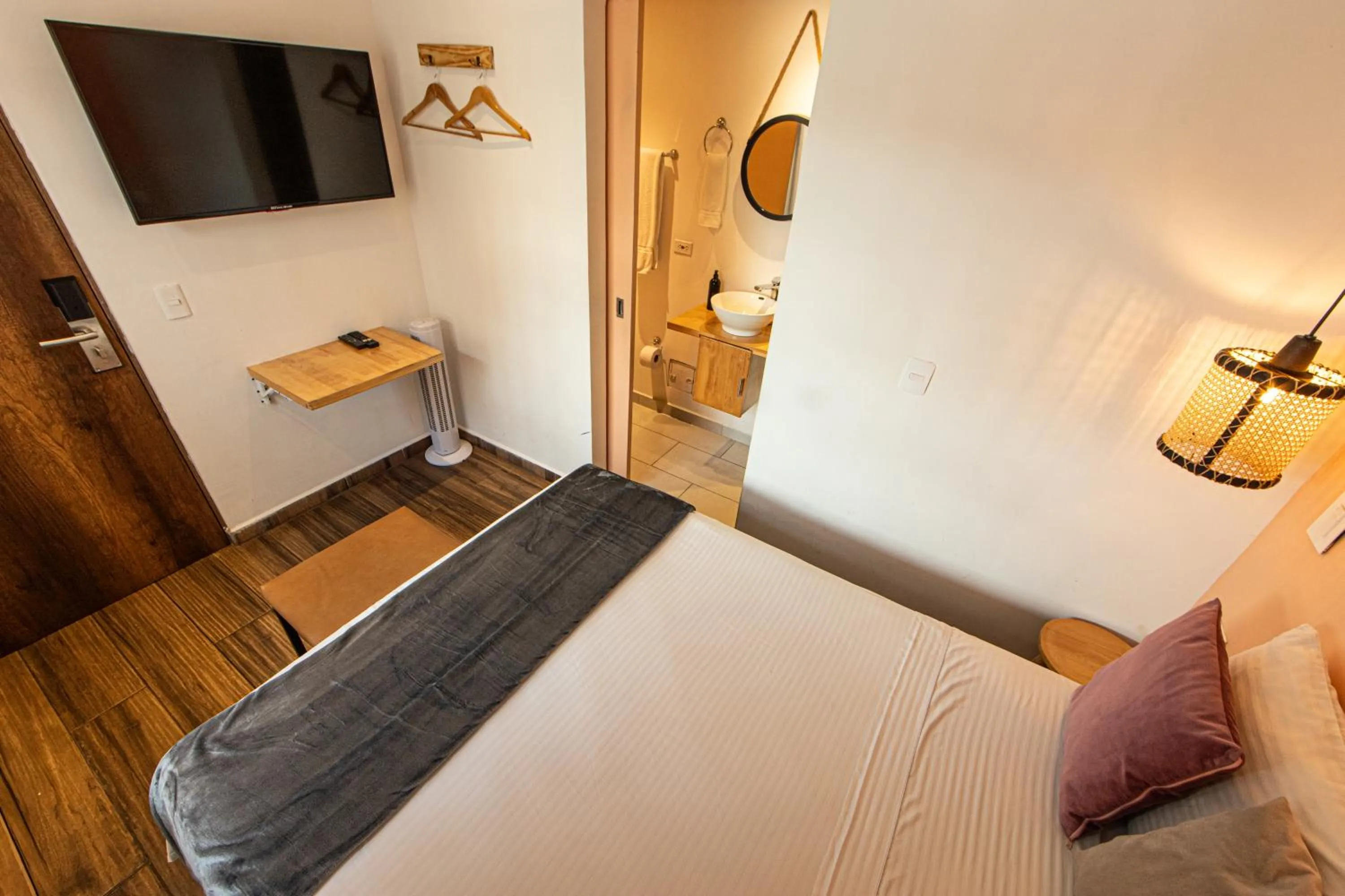 Bed in La Martina Boutique Hotel