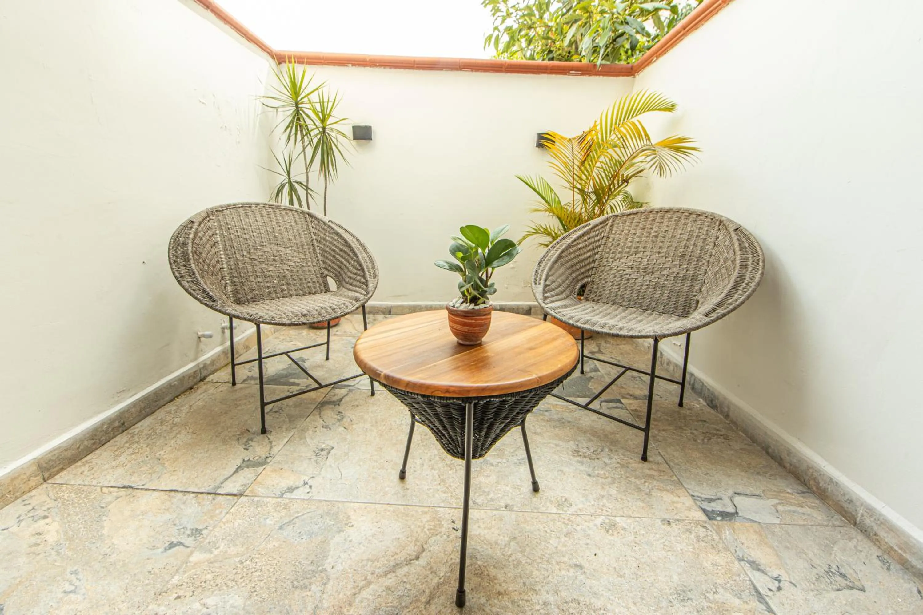 Seating area in La Martina Boutique Hotel