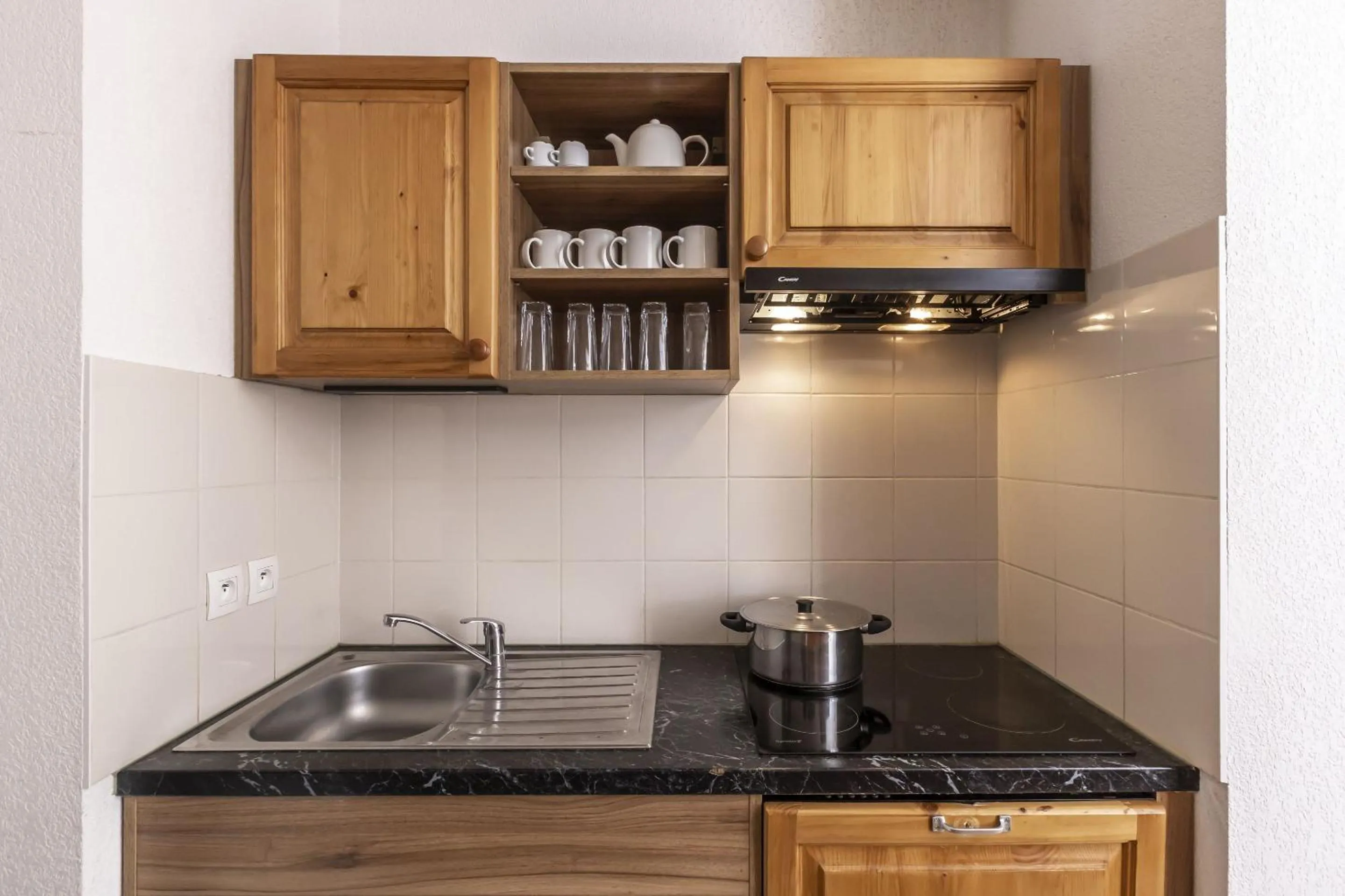 Kitchen or kitchenette in Résidence Odalys Les Bergers