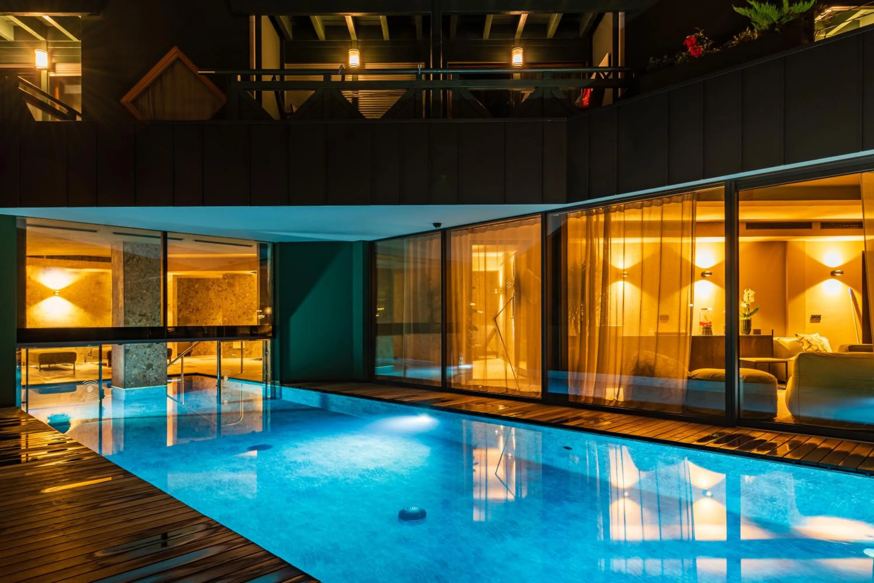 Swimming pool in Nancy's Holiday Homes Dolomites