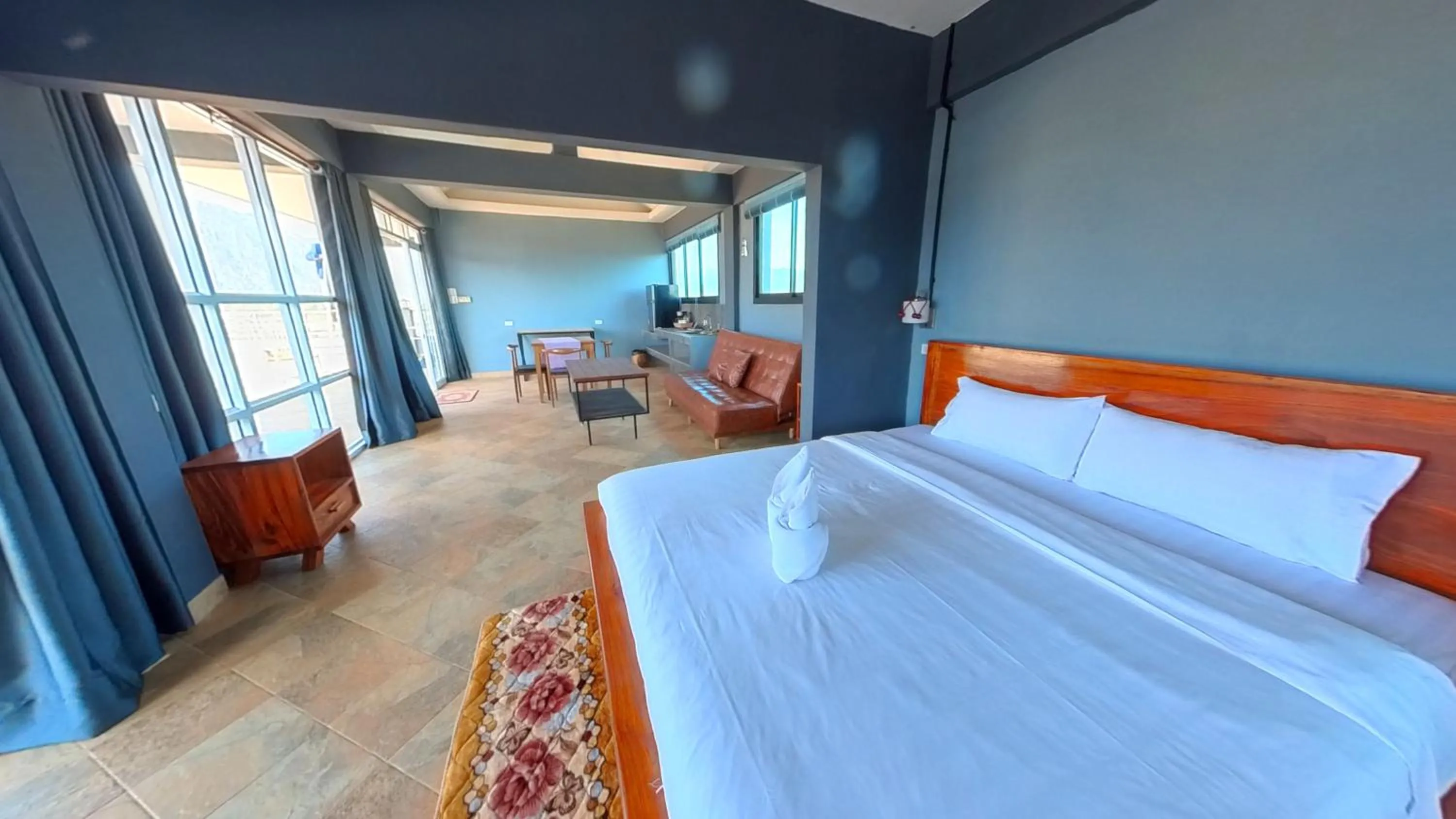 Bed in FARAWAY SUITES