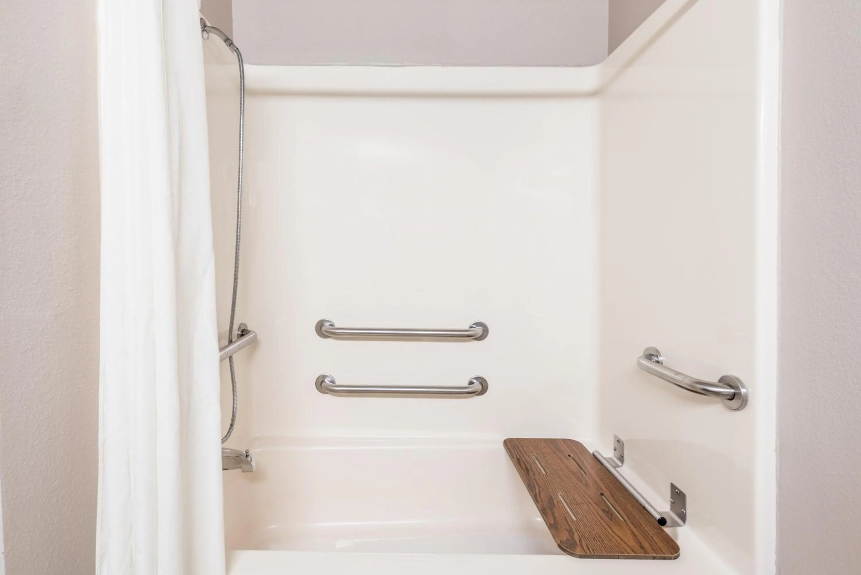 Shower in Super 8 by Wyndham Fort Worth North