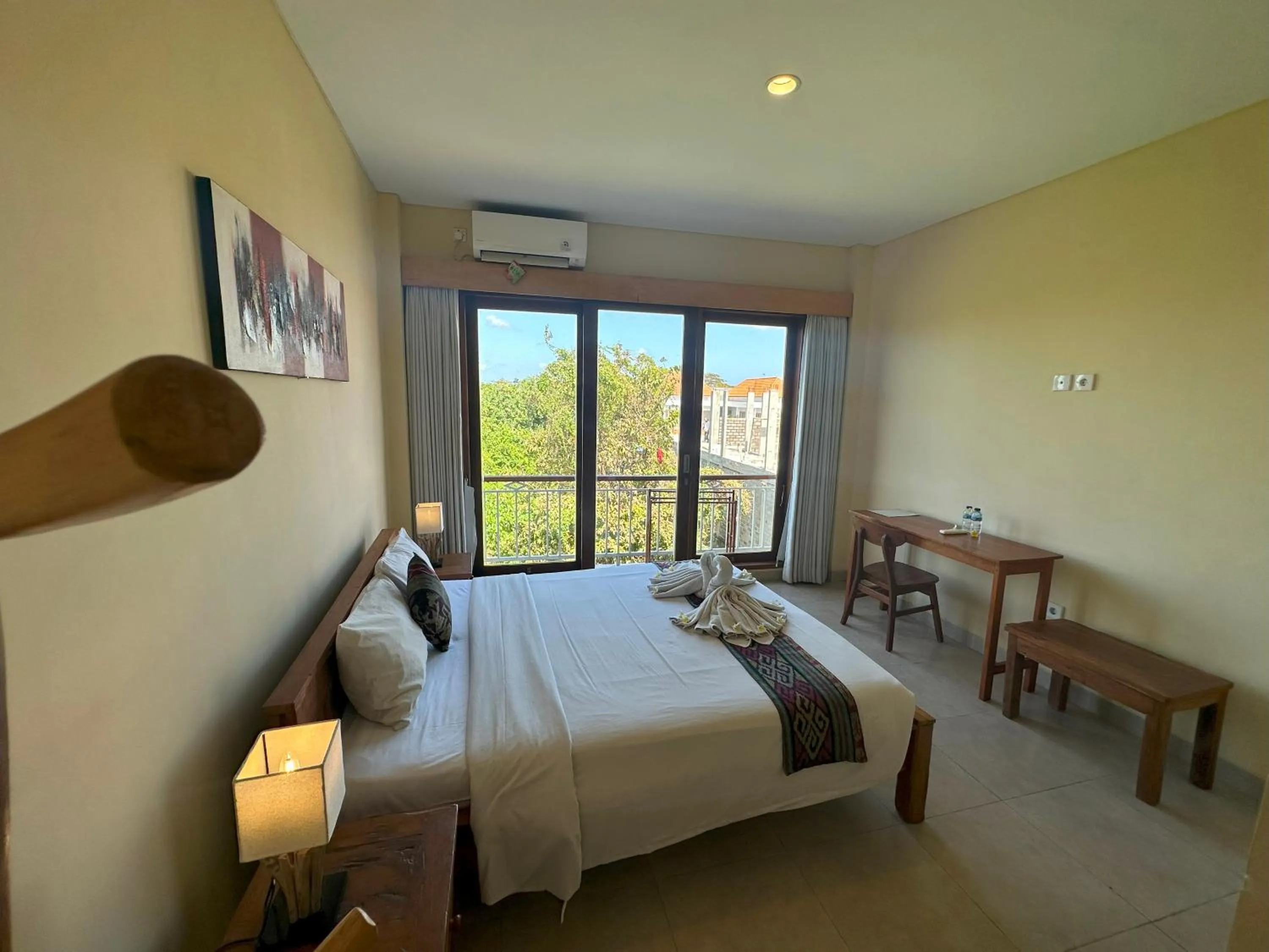 Bed in Oka's Guest House Canggu