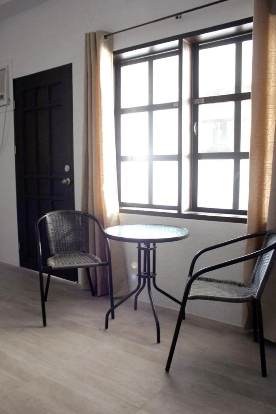 Seating area in Sentro Suites Siargao