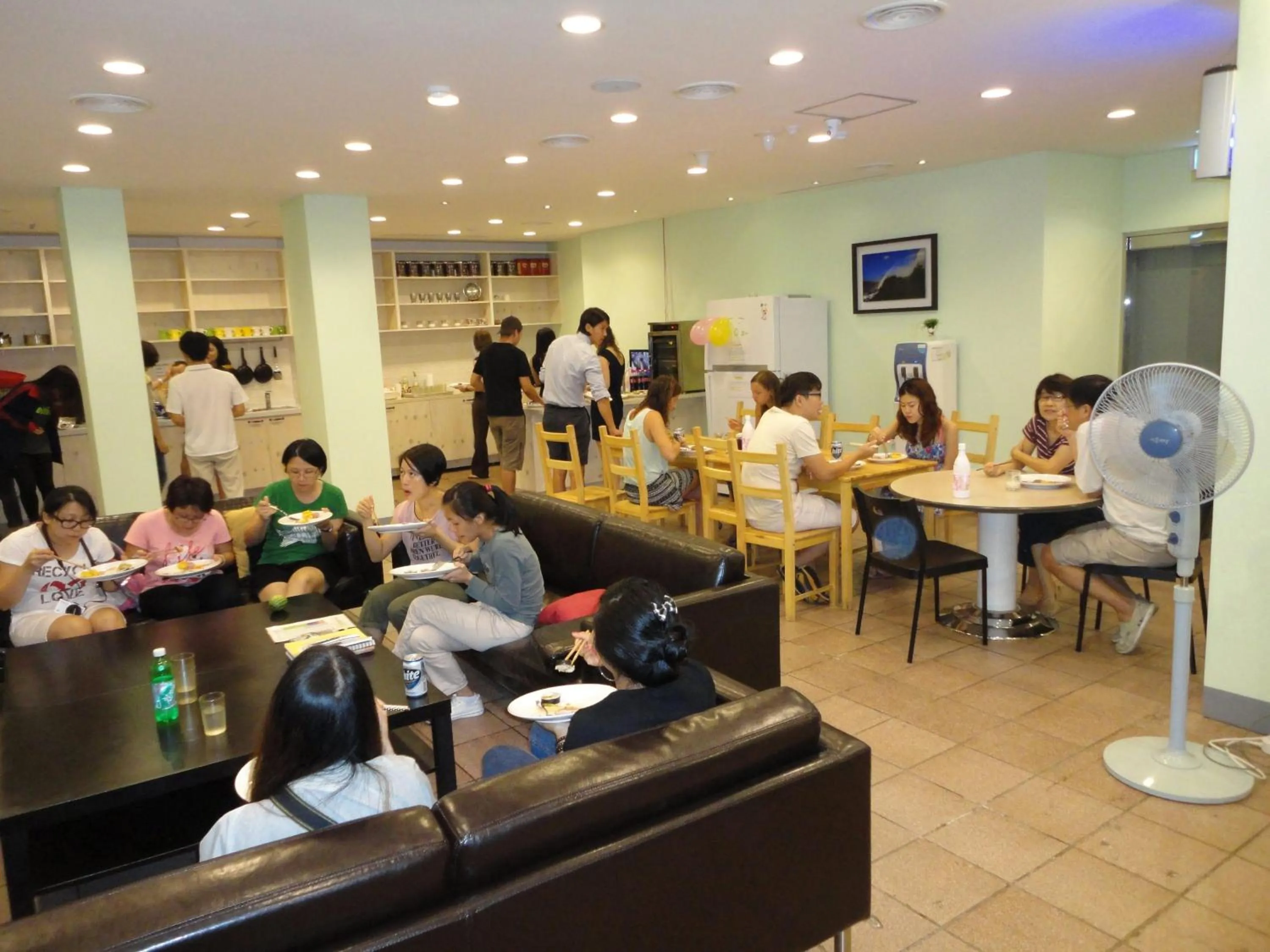 Communal lounge/ TV room in You&I Guesthouse