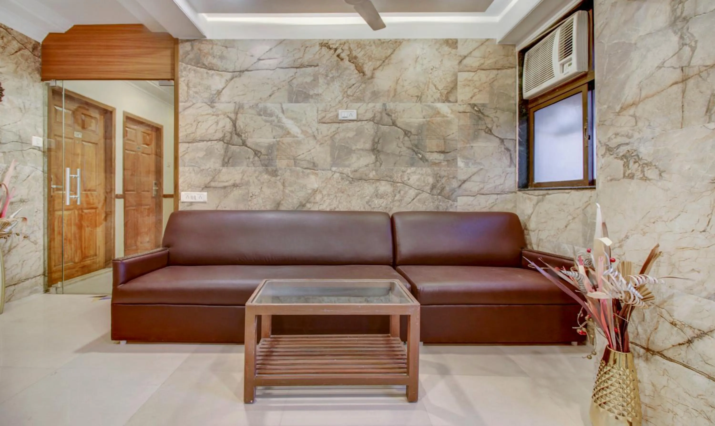 Seating area in Treebo Cruz Royale Santacruz West