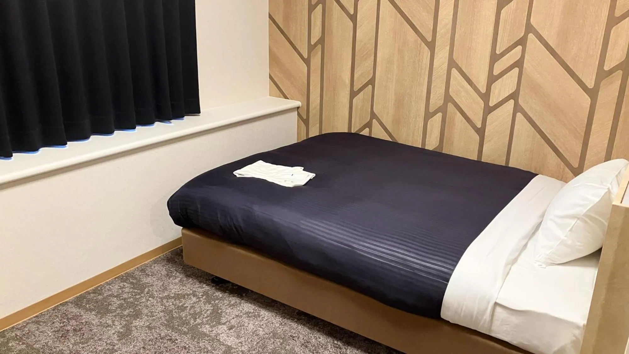 Bed in HOTEL LiVEMAX BUDGET Shinbashi