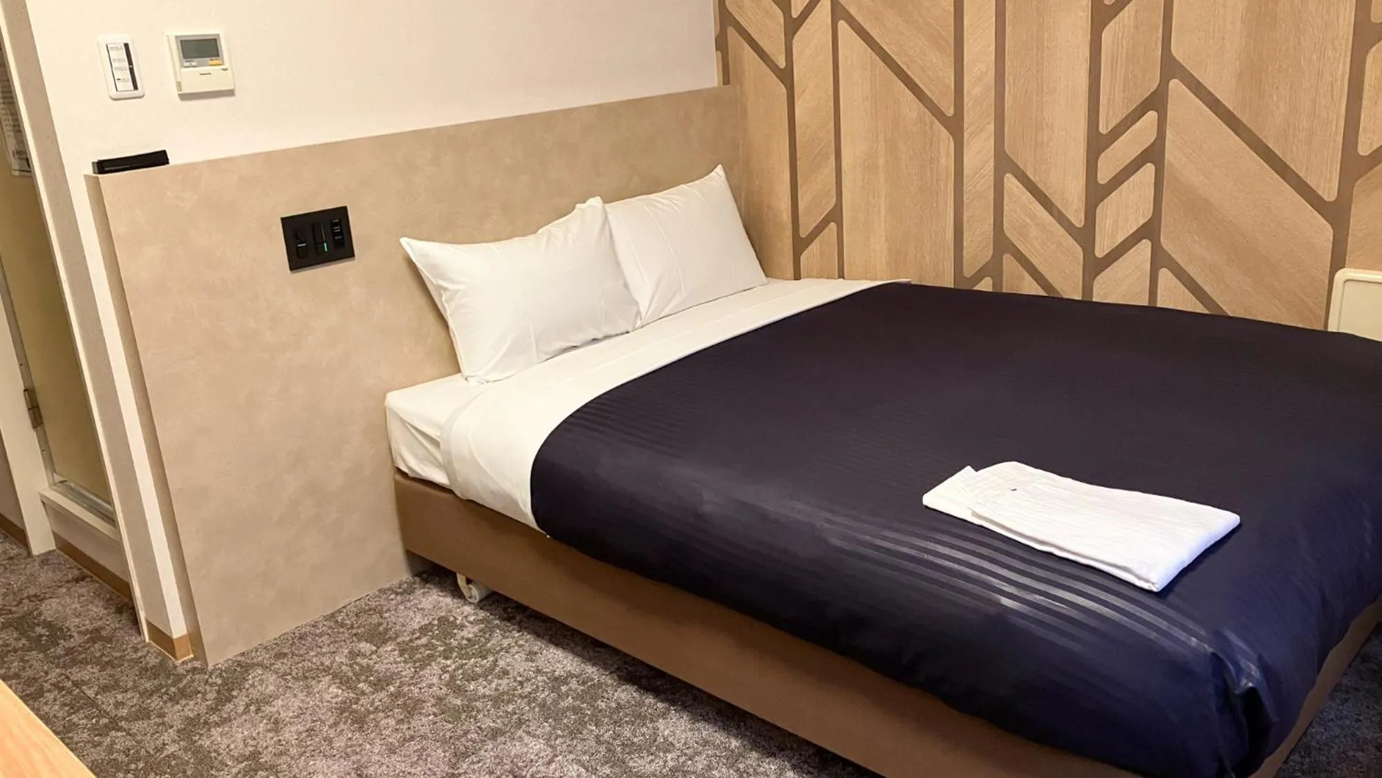 Bed in HOTEL LiVEMAX BUDGET Shinbashi