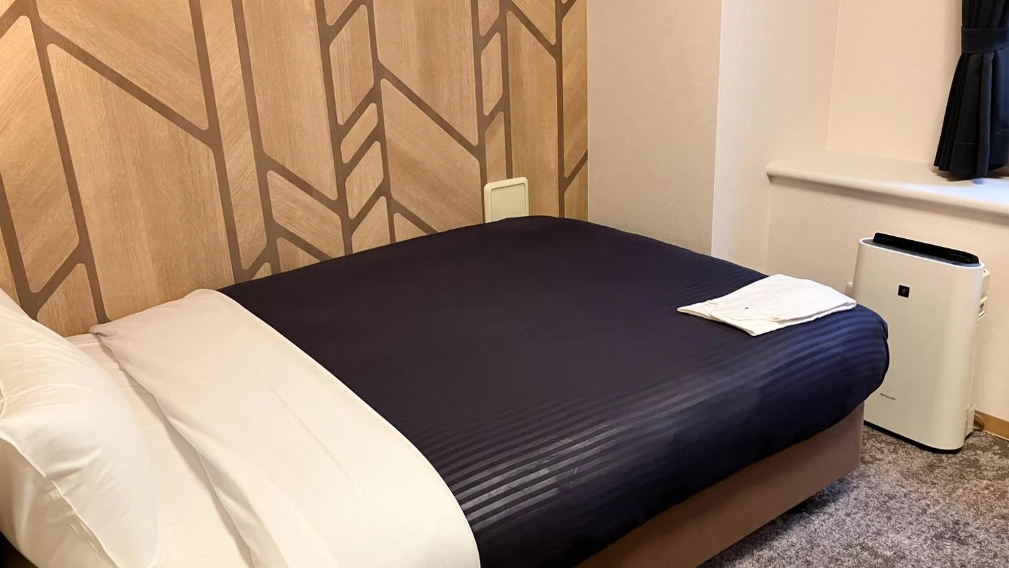 Bed in HOTEL LiVEMAX BUDGET Shinbashi