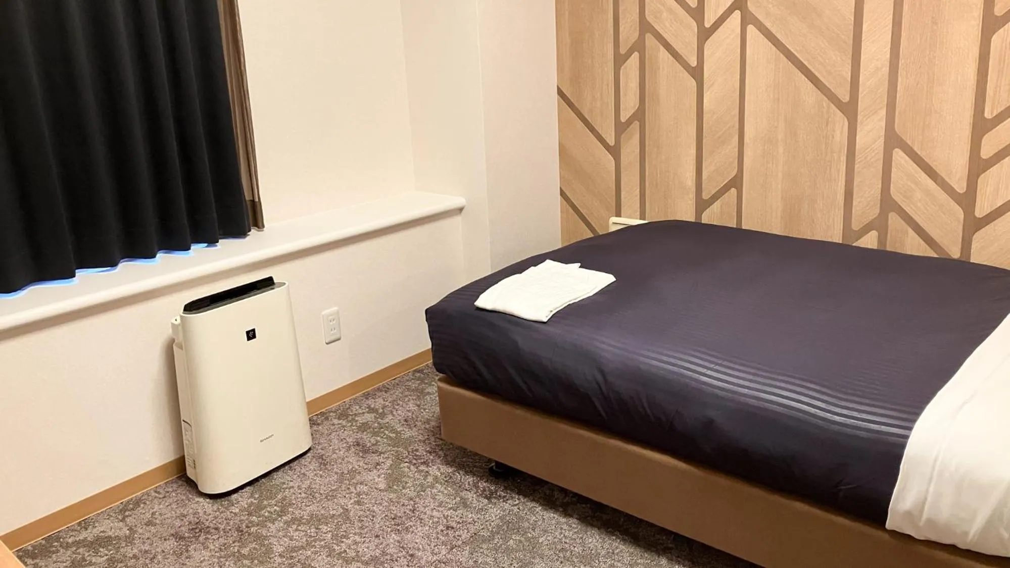 Bed in HOTEL LiVEMAX BUDGET Shinbashi