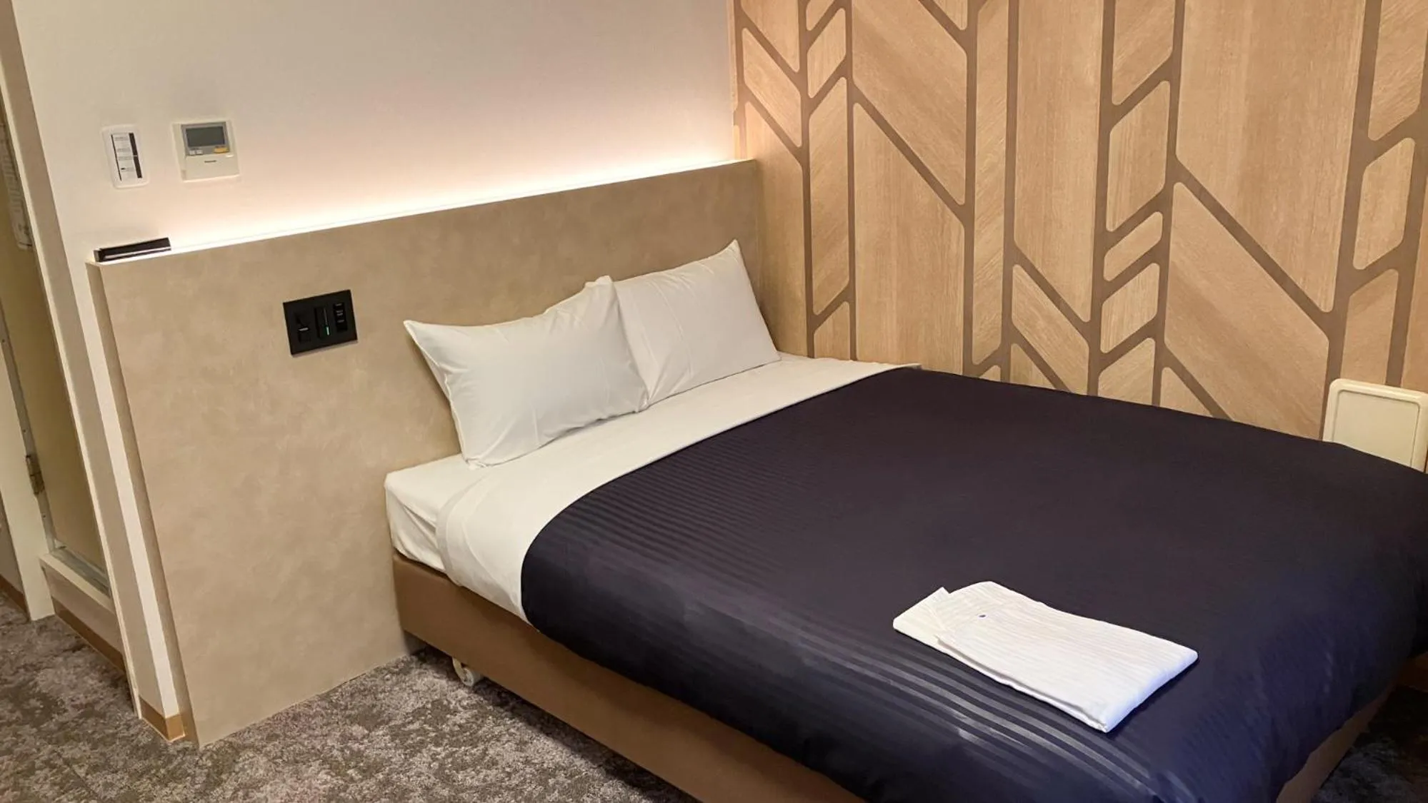 Bed in HOTEL LiVEMAX BUDGET Shinbashi