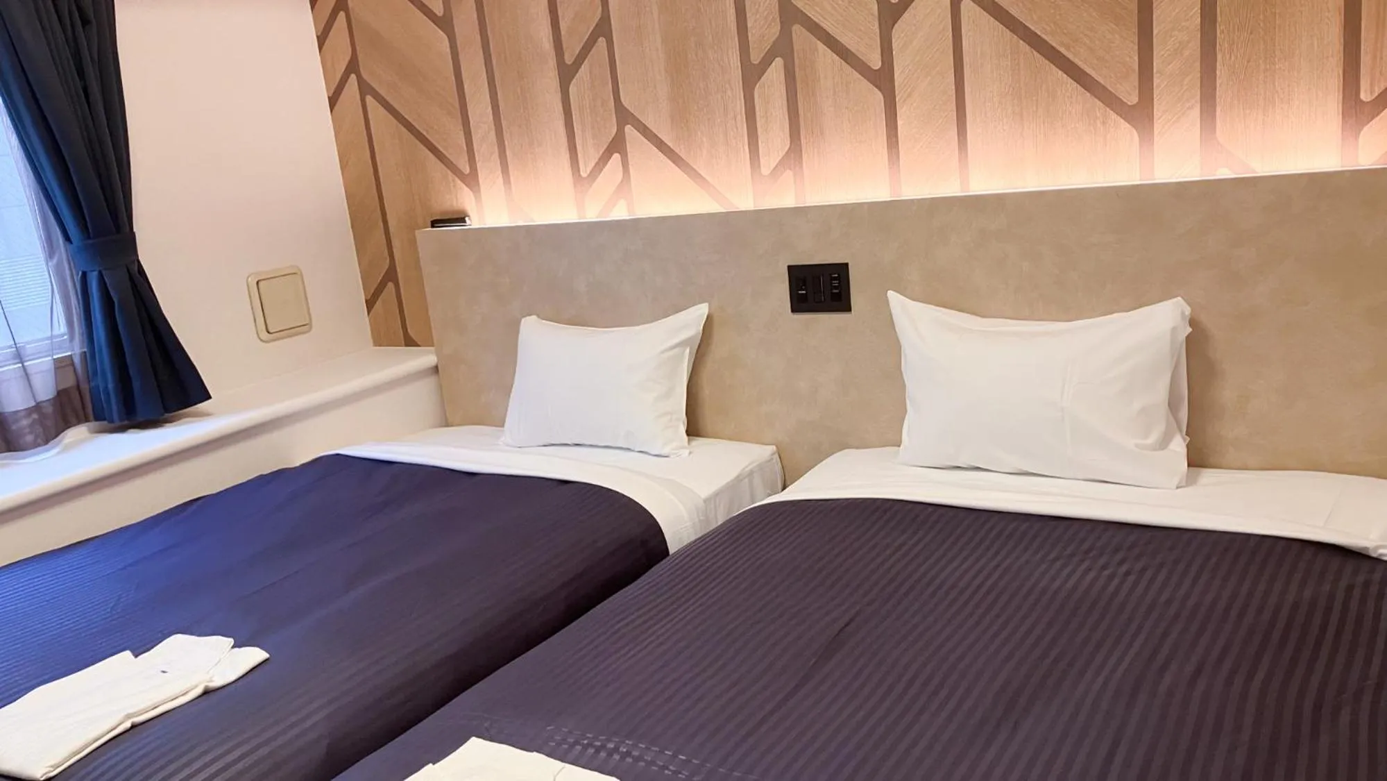 Bed in HOTEL LiVEMAX BUDGET Shinbashi