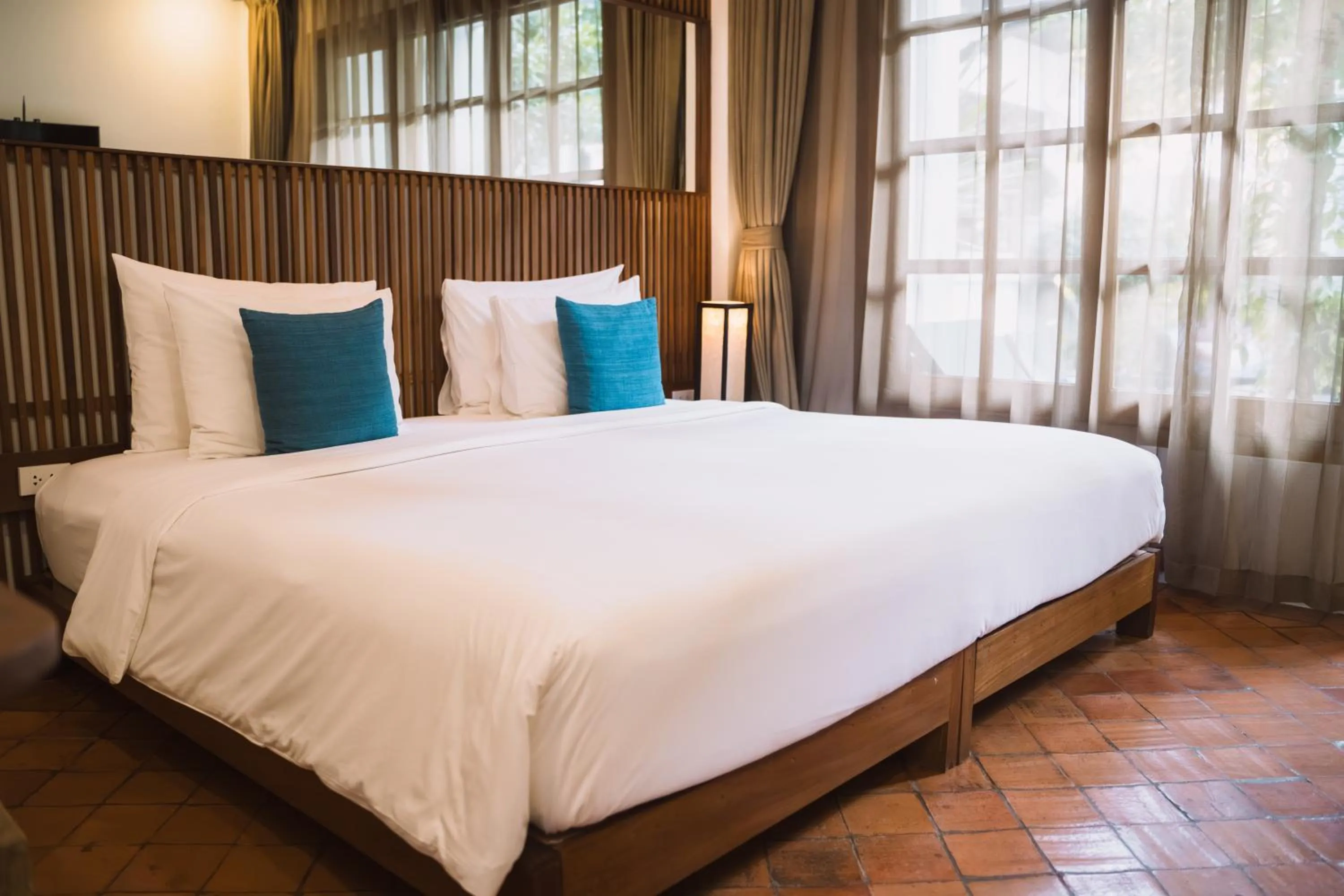 Bed in Le Sen Boutique Hotel