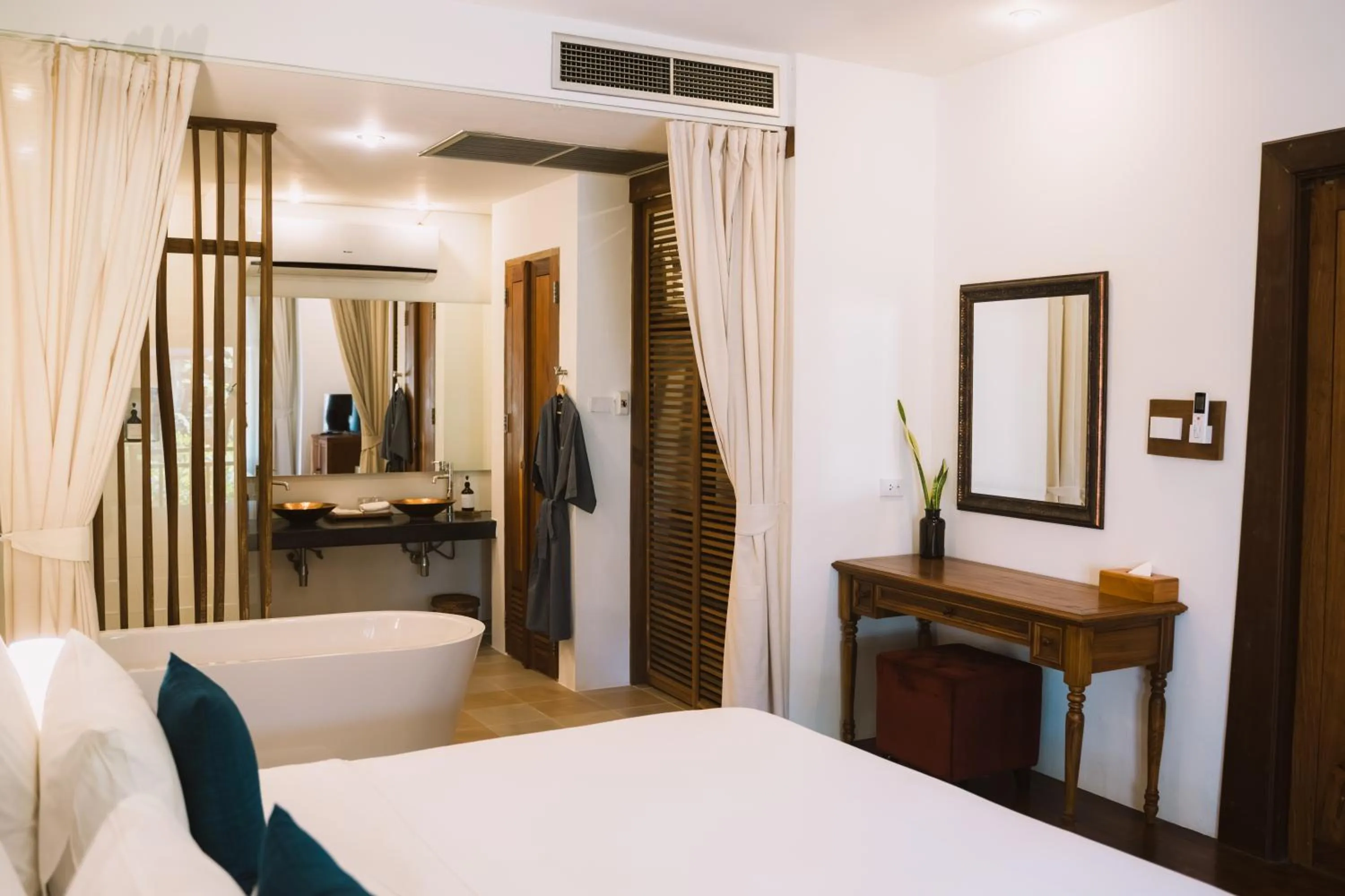 Bed in Le Sen Boutique Hotel