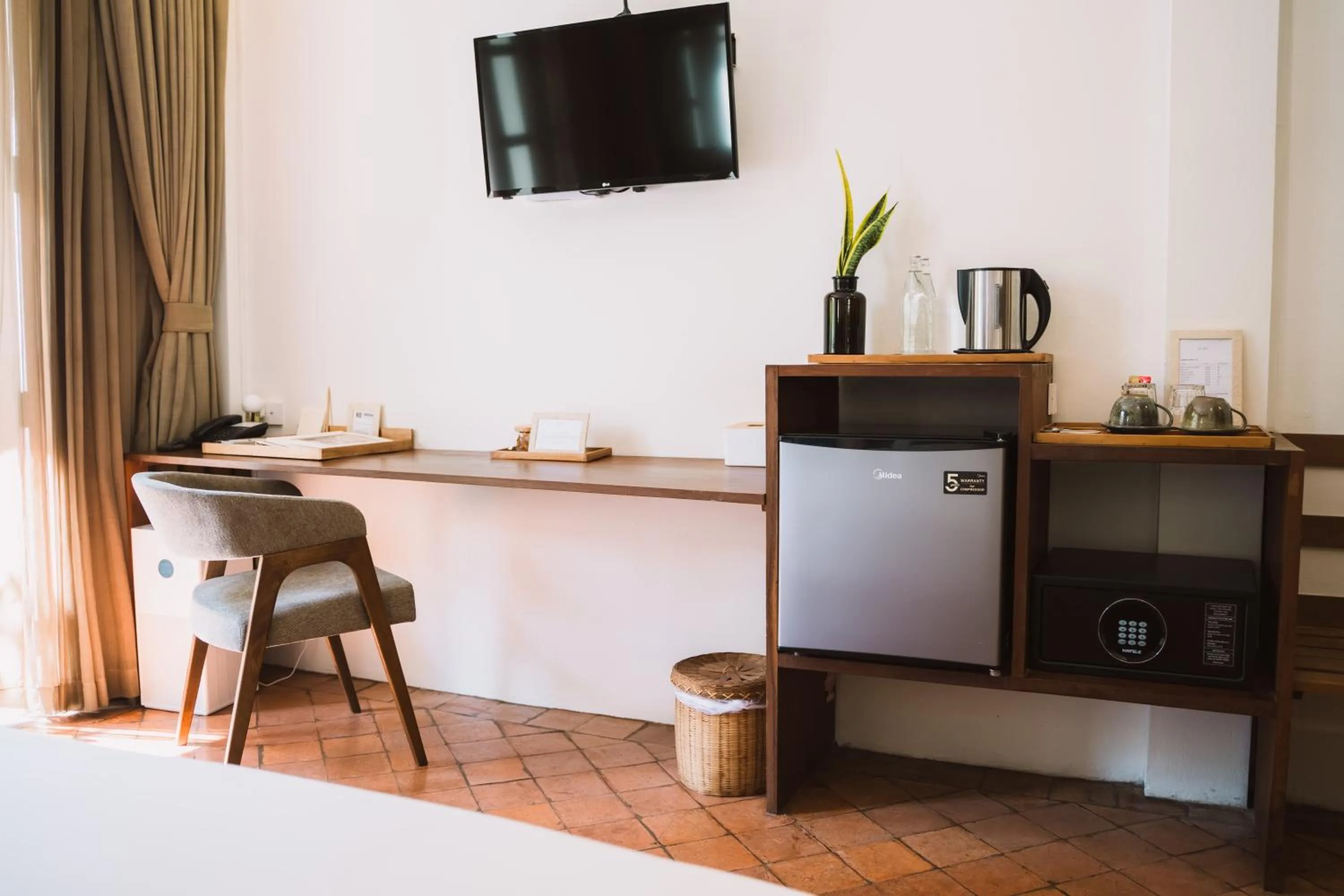 Bedroom in Le Sen Boutique Hotel